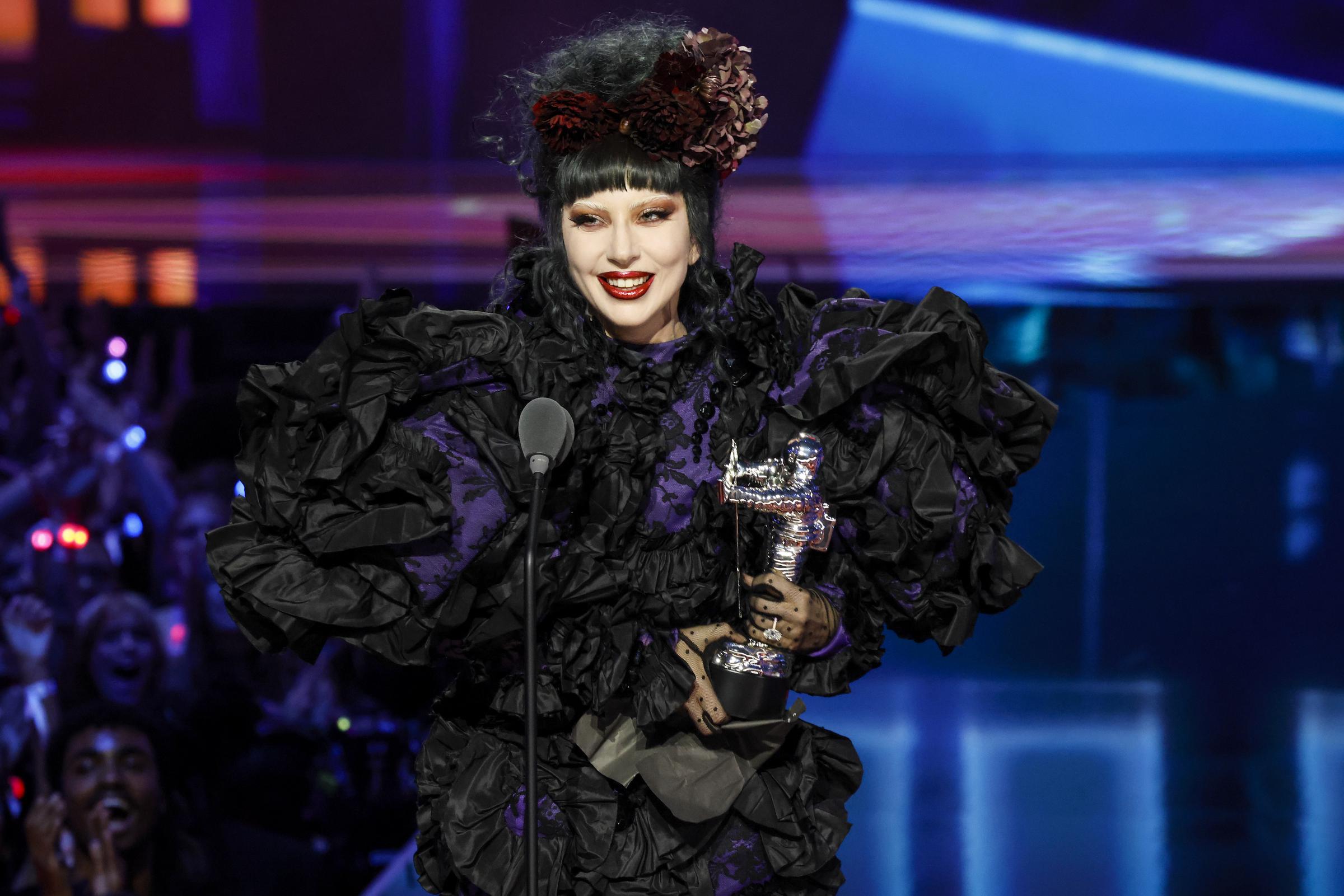 Lady Gaga holds her Artist of the Year trophy during the MTV Video Music Awards at UBS Arena on September 7, 2025 | Source: Getty Images
