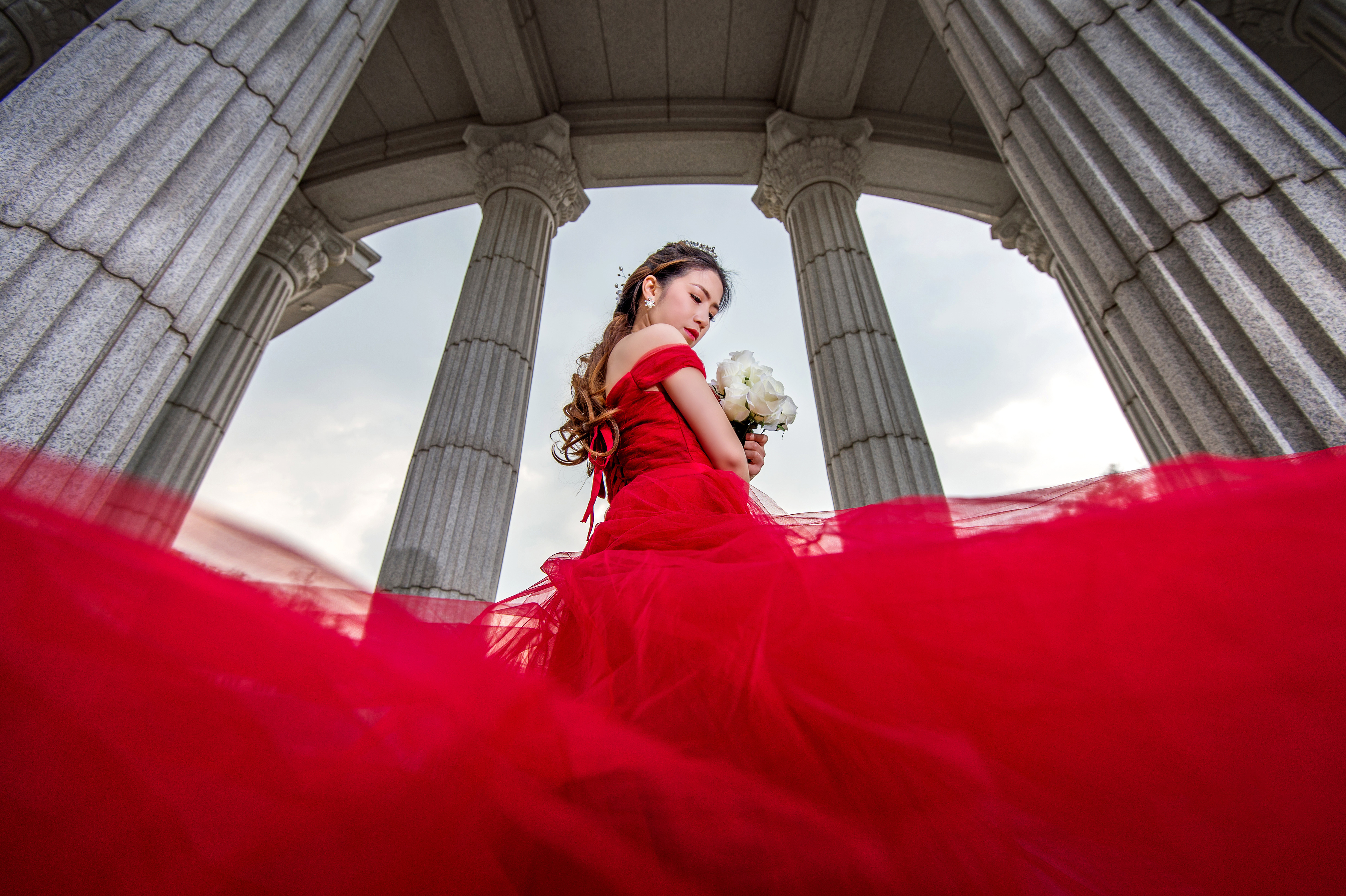 A bride in red wedding dress | Source: Shutterstock