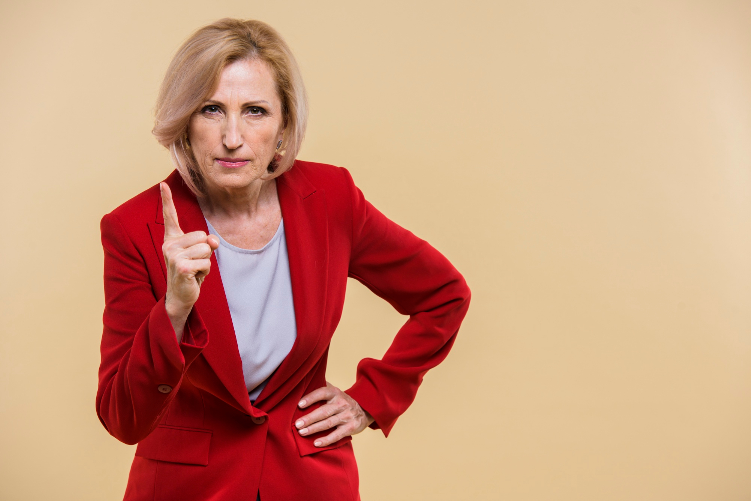 An angry senior woman | Source: Freepik