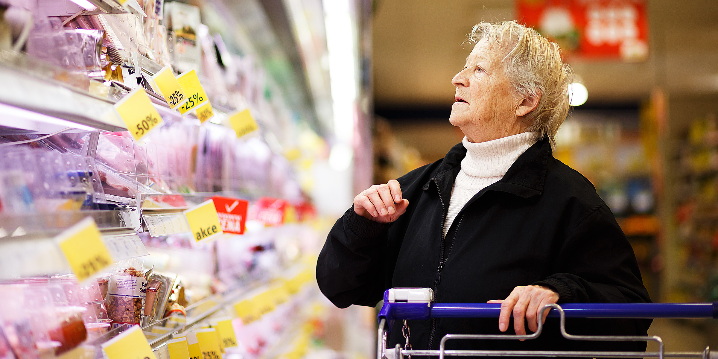 An older woman in a supermarket | Source: Shutterstock