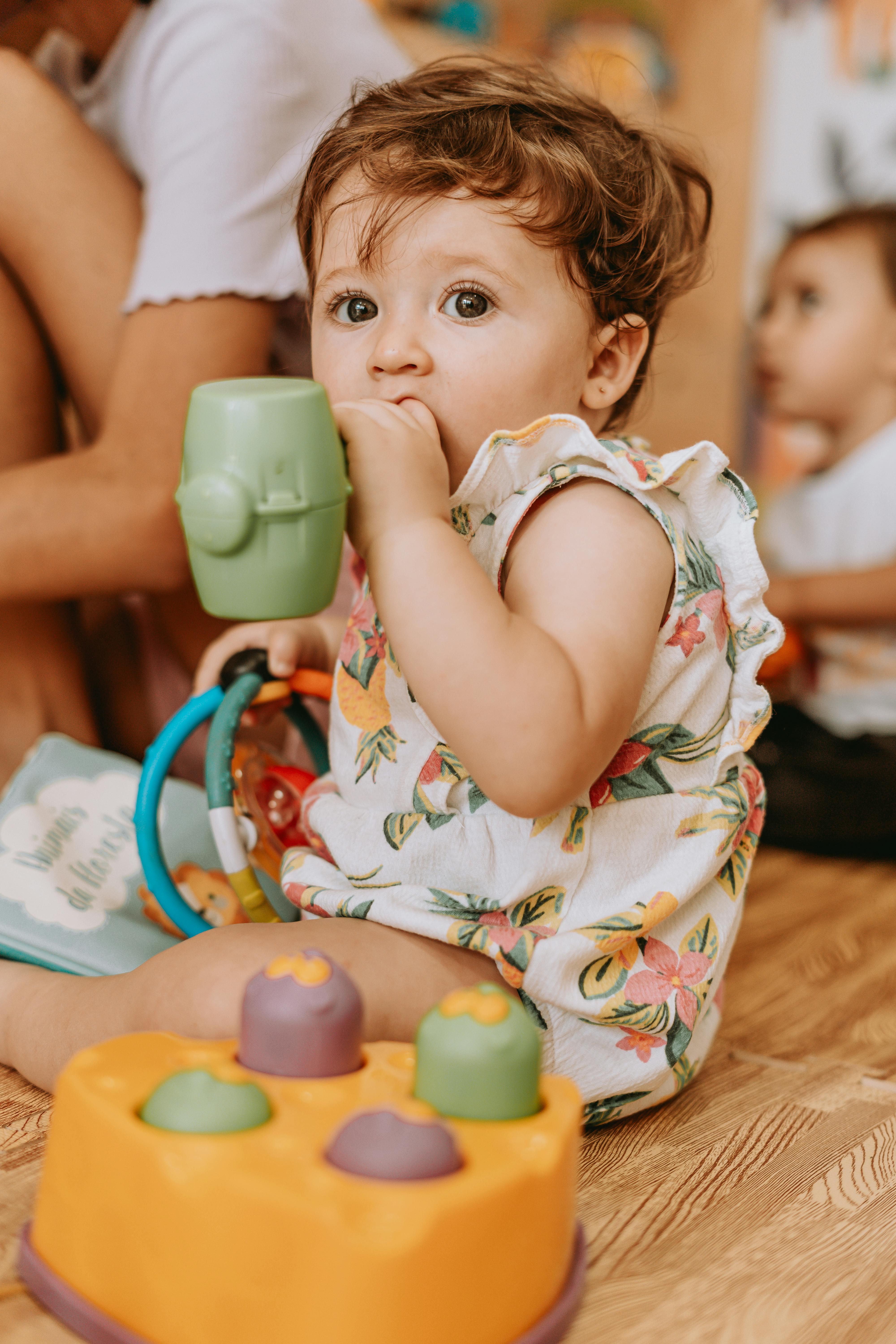 A baby playing with toys | Source: Pexels
