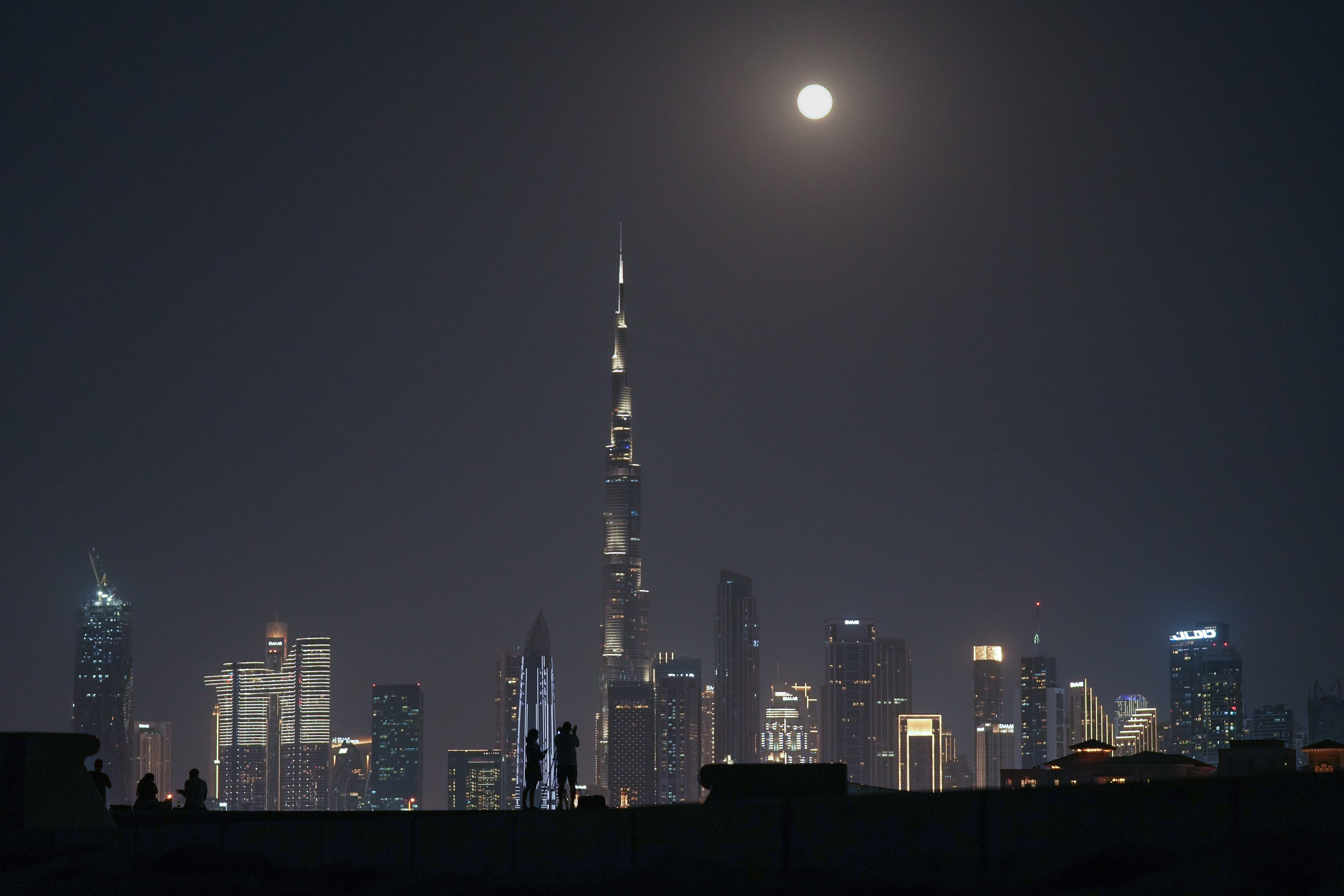 The super blue moon rising over the Burj Khalifa tower in Dubai, United Arab Emirates, on August 31, 2023 | Source: Getty Images