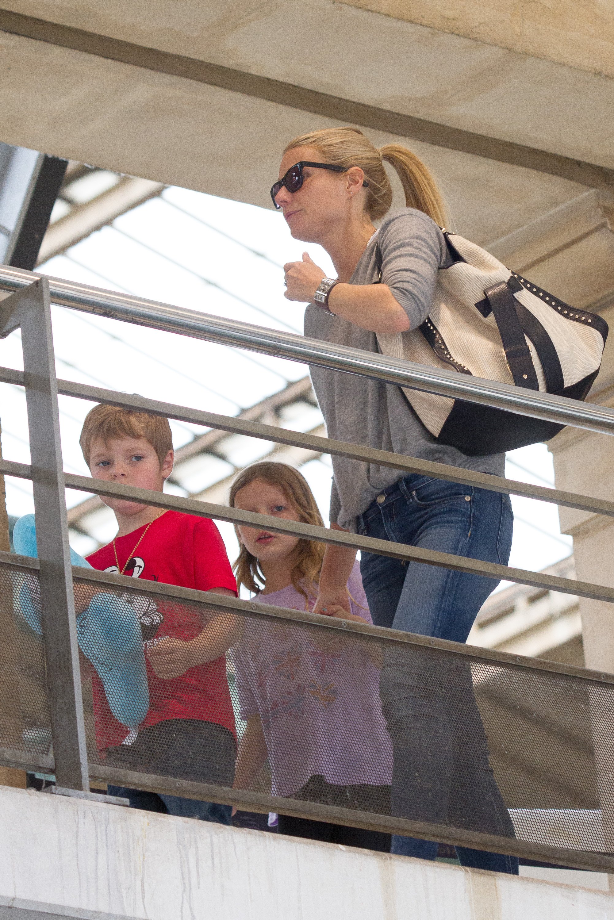 Gwyneth Paltrow and her children, son Moses and daughter Apple arriving at the Gare du Nord station on April 15, 2013 in Paris, France | Source: Getty Images