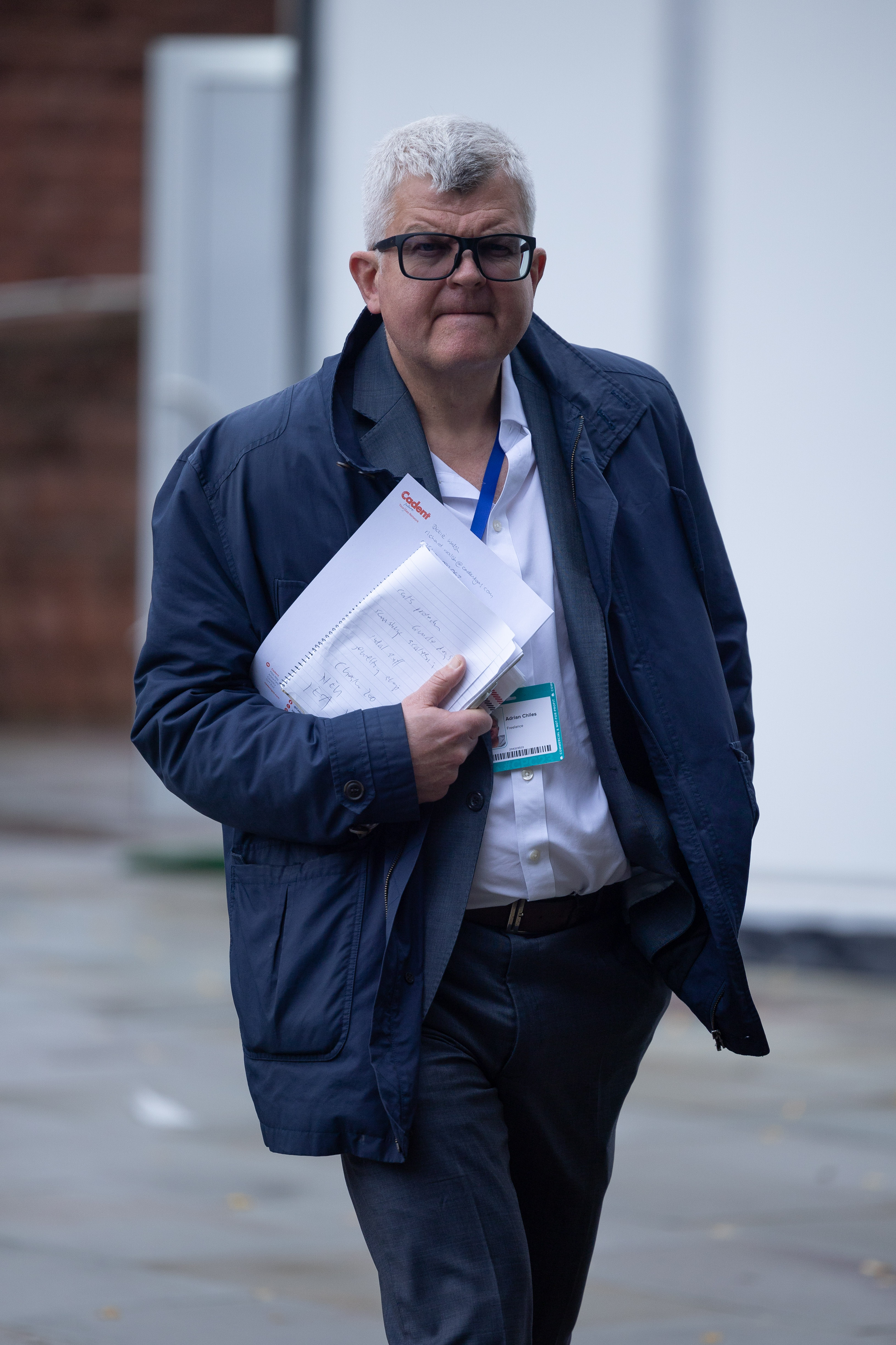 Adrian Chiles carrying a document during the Conservative Party Conference at Manchester Central Convention Complex on 3 October 2023 in Manchester. | Source: Getty Images