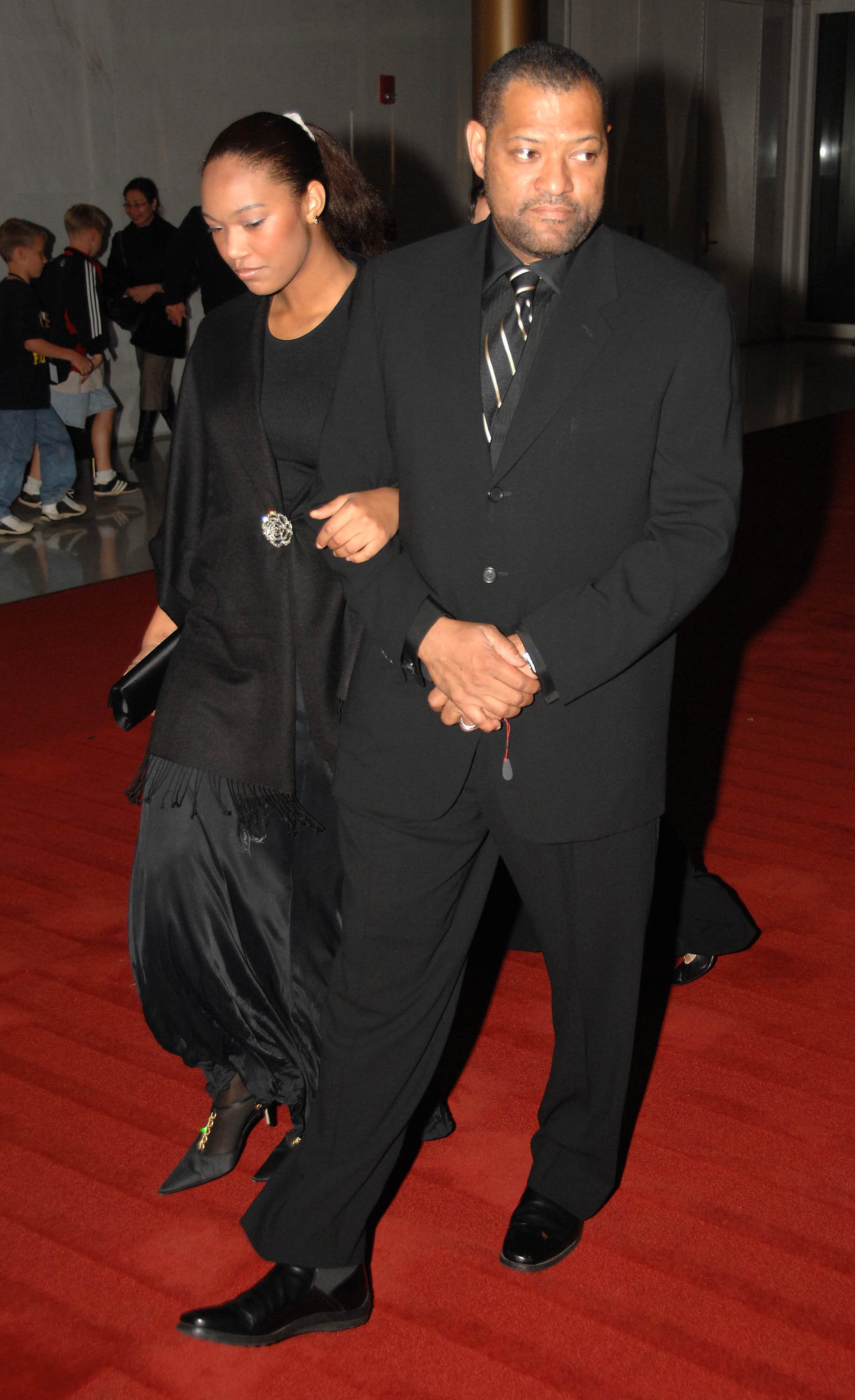 Laurence Fishburne and his daughter, Montana, on the red carpet at the National Dream Dinner Gala celebrating the Martin Luther King Jr. Memorial Groundbreaking on November 13, 2006, in Washington | Source: Getty Images