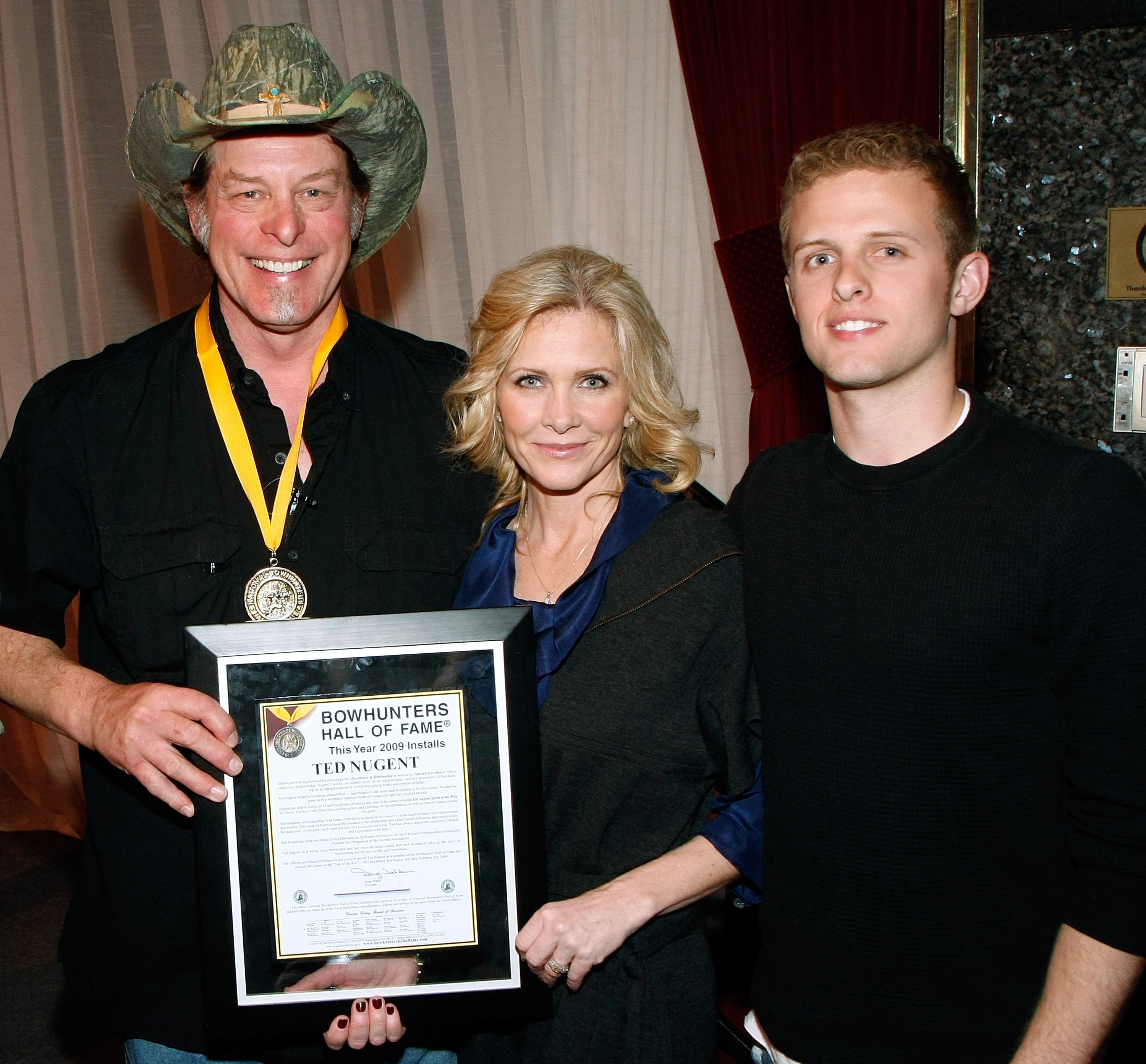 Music artist Ted Nugent, his wife Shemane Nugent and son Rocco Nugent appear after Ted Nugent was inducted into the National Bowhunters Hall of Fame at the Riviera Hotel & Casino February 6, 2009, in Las Vegas, Nevada. | Source: Getty Images