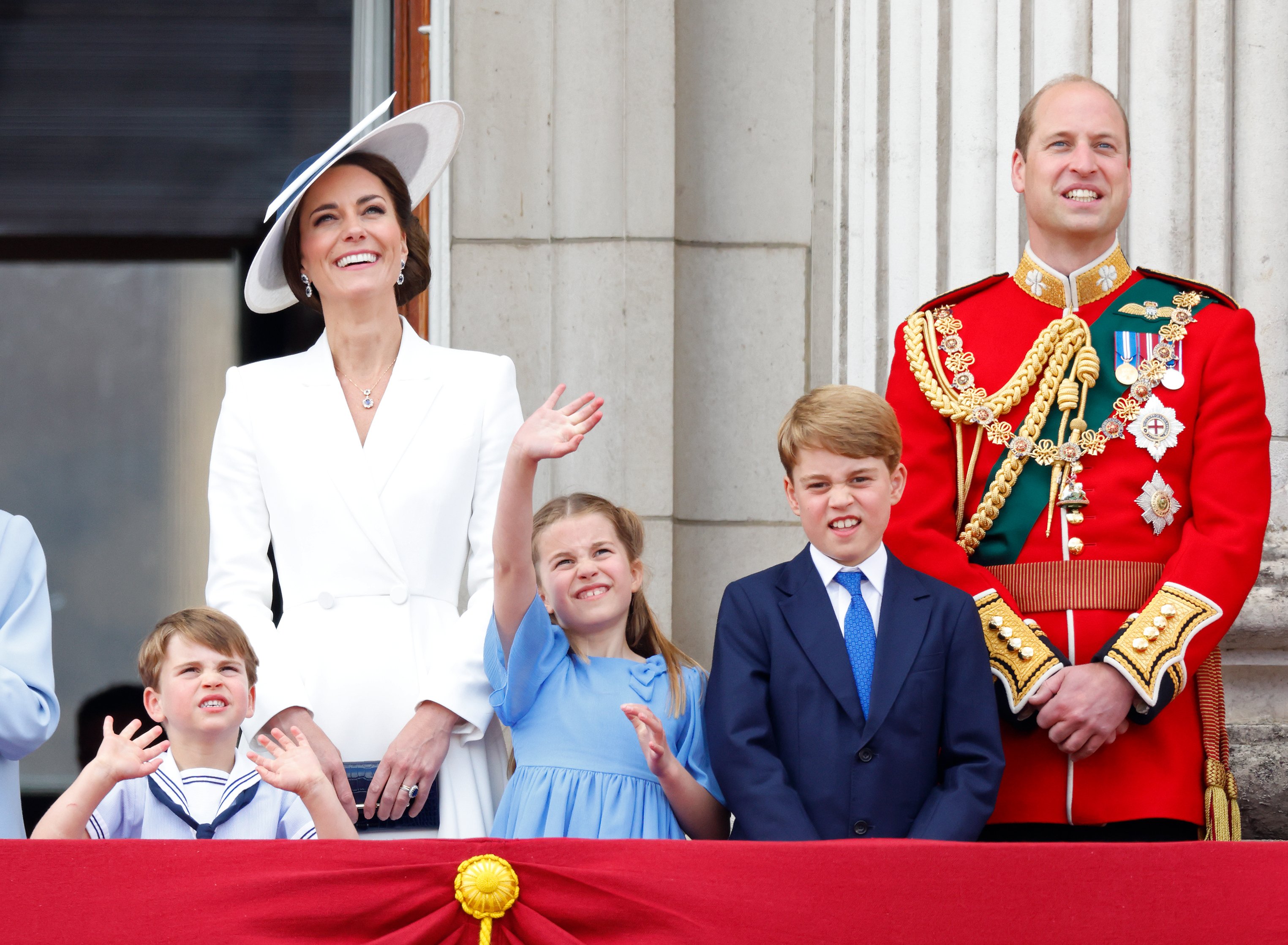 Prince Louis of Cambridge, Catherine, Duchess of Cambridge, Princess Charlotte of Cambridge, Prince George of Cambridge and Prince William, Duke of Cambridge watch a flypast from the balcony of Buckingham Palace during Trooping the Color on June 2 2022 in London, England |  Source: Getty Images