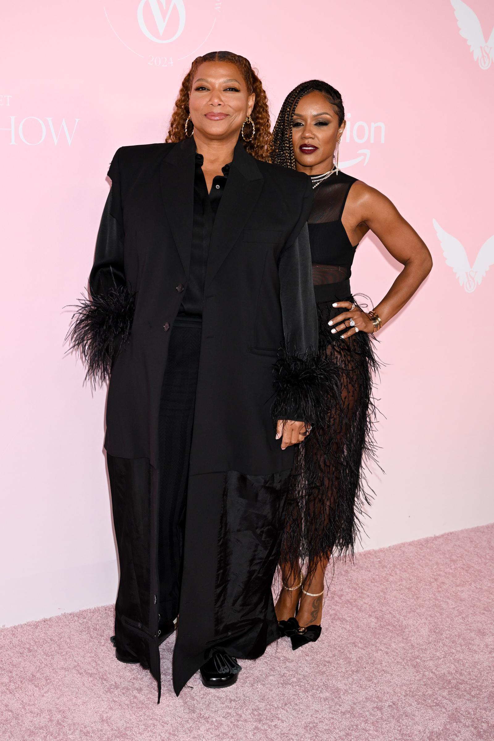 Queen Latifah and Eboni Nichols at the Victoria's Secret Fashion Show held at the Brooklyn Navy Yard in New York on October 15, 2024. | Source: Getty Images
