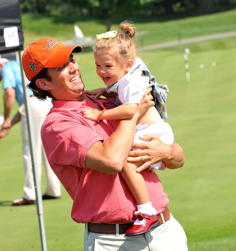 Donald Trump Jr.and his 3 year old daughter Kai Madison Trump attend the 3rd annual Eric Trump Foundation Golf Invitational at the Trump National Golf Club Westchester | Photo: Getty Images