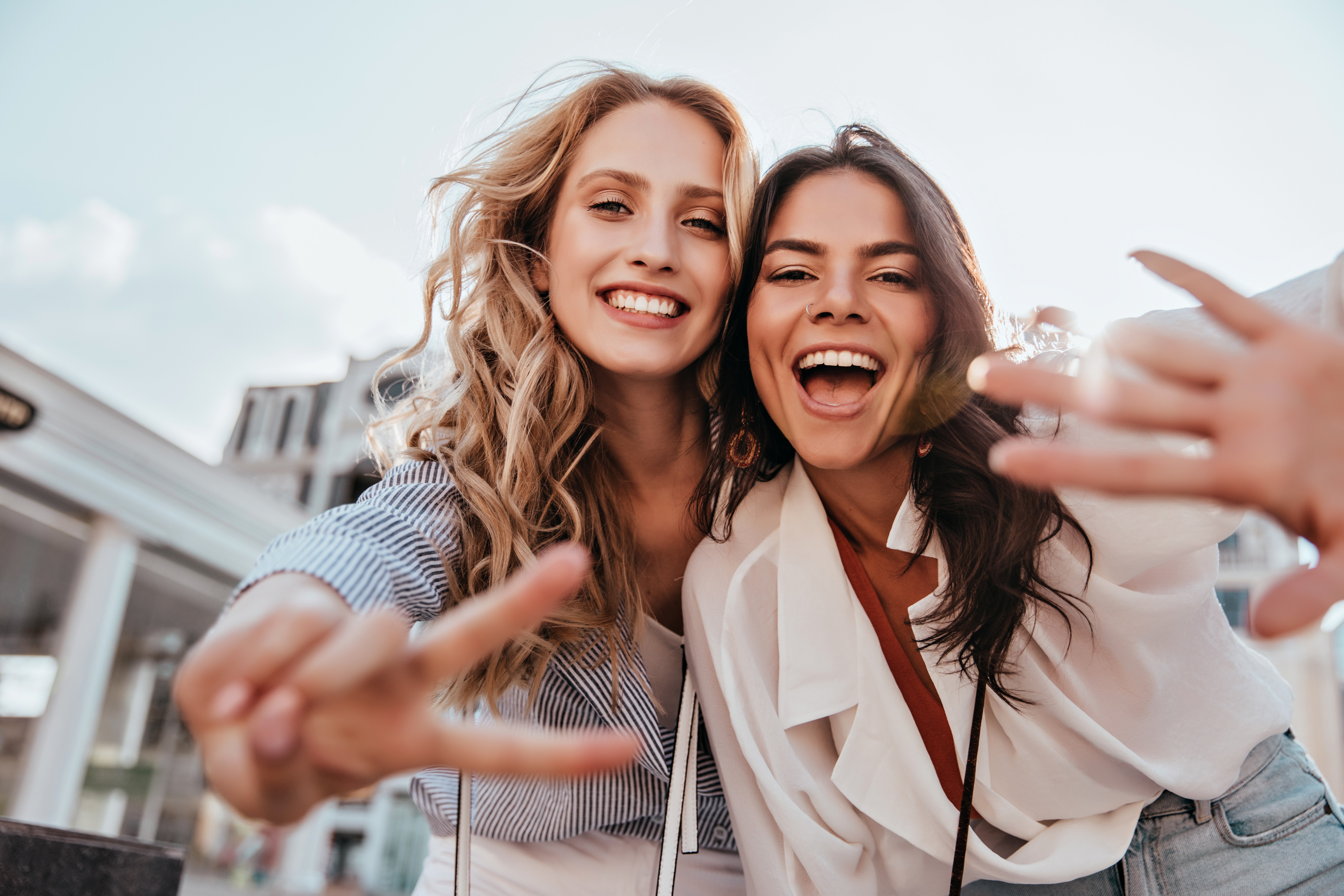 Two women laughing | Source: Shutterstock