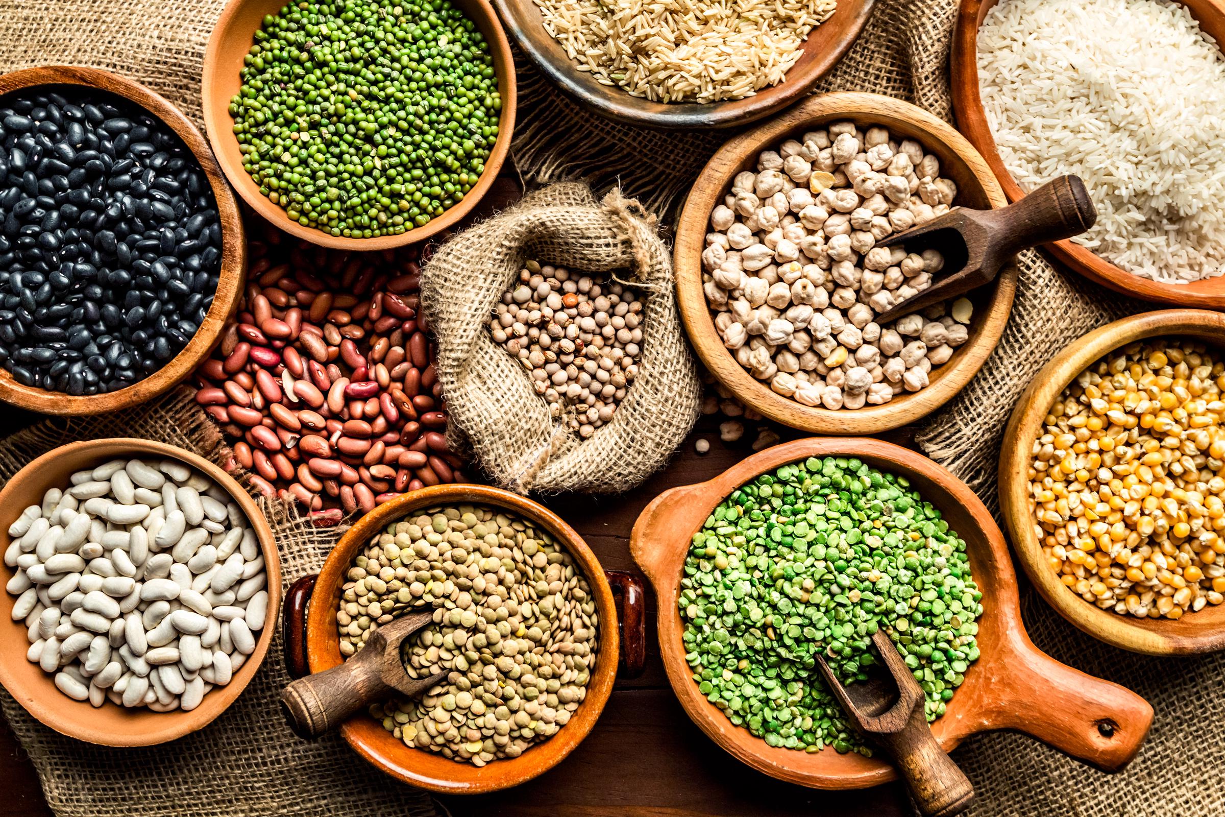 Various bowls of beans and legumes | Source: Getty Images