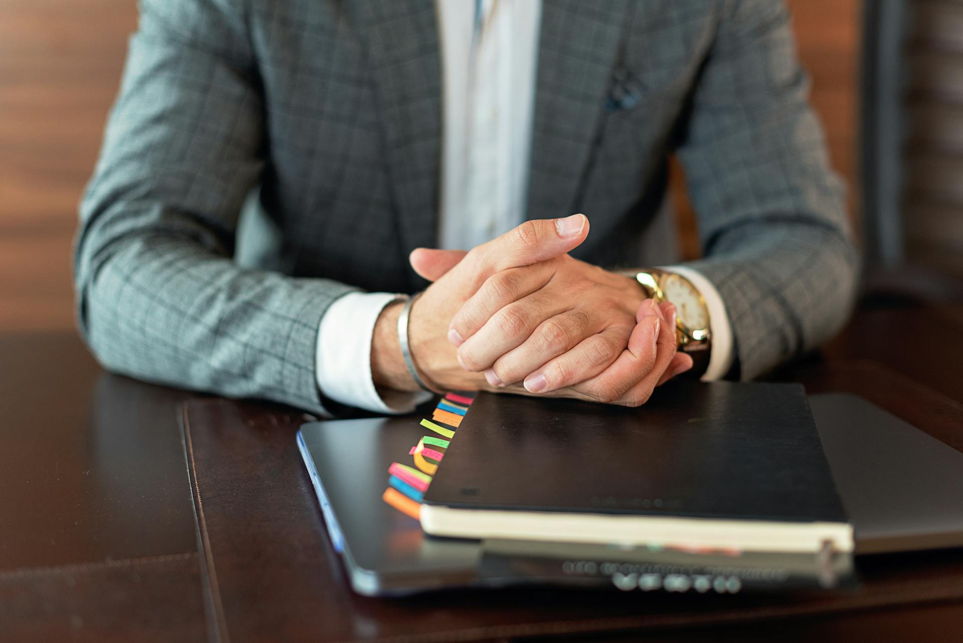 Man seated in his office | Source: Pexels