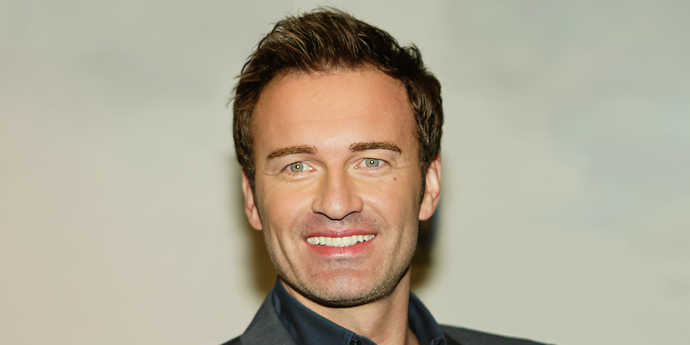 Julian McMahon | Source: Getty Images