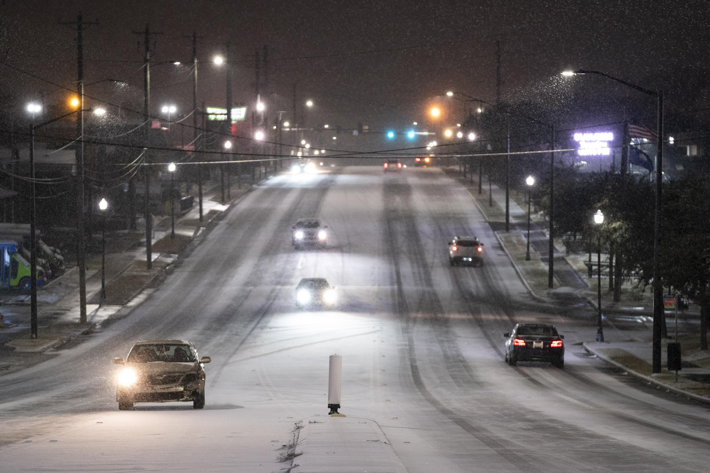 Motorists navigate the snow in Cayce, South Carolina, on January 21, 2025 | Source: Getty Images