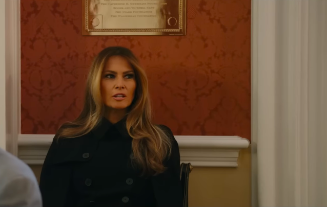 Melania Trump addressing her husband, Donald Trump, during a meeting. | Source: YouTube/Amazon MGM Studios