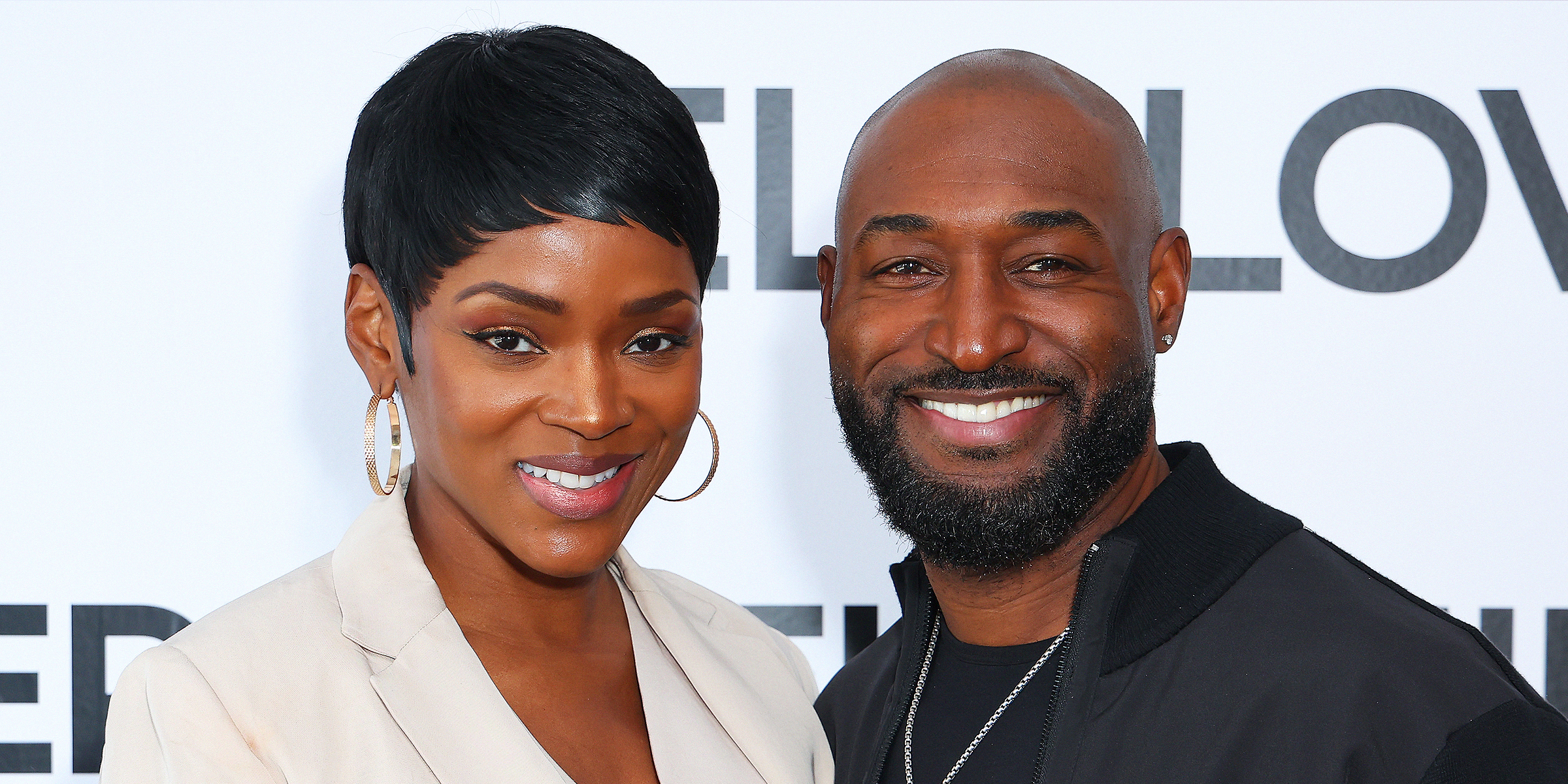 Caroline Chikezie and Adrian Holmes | Source: Getty Images