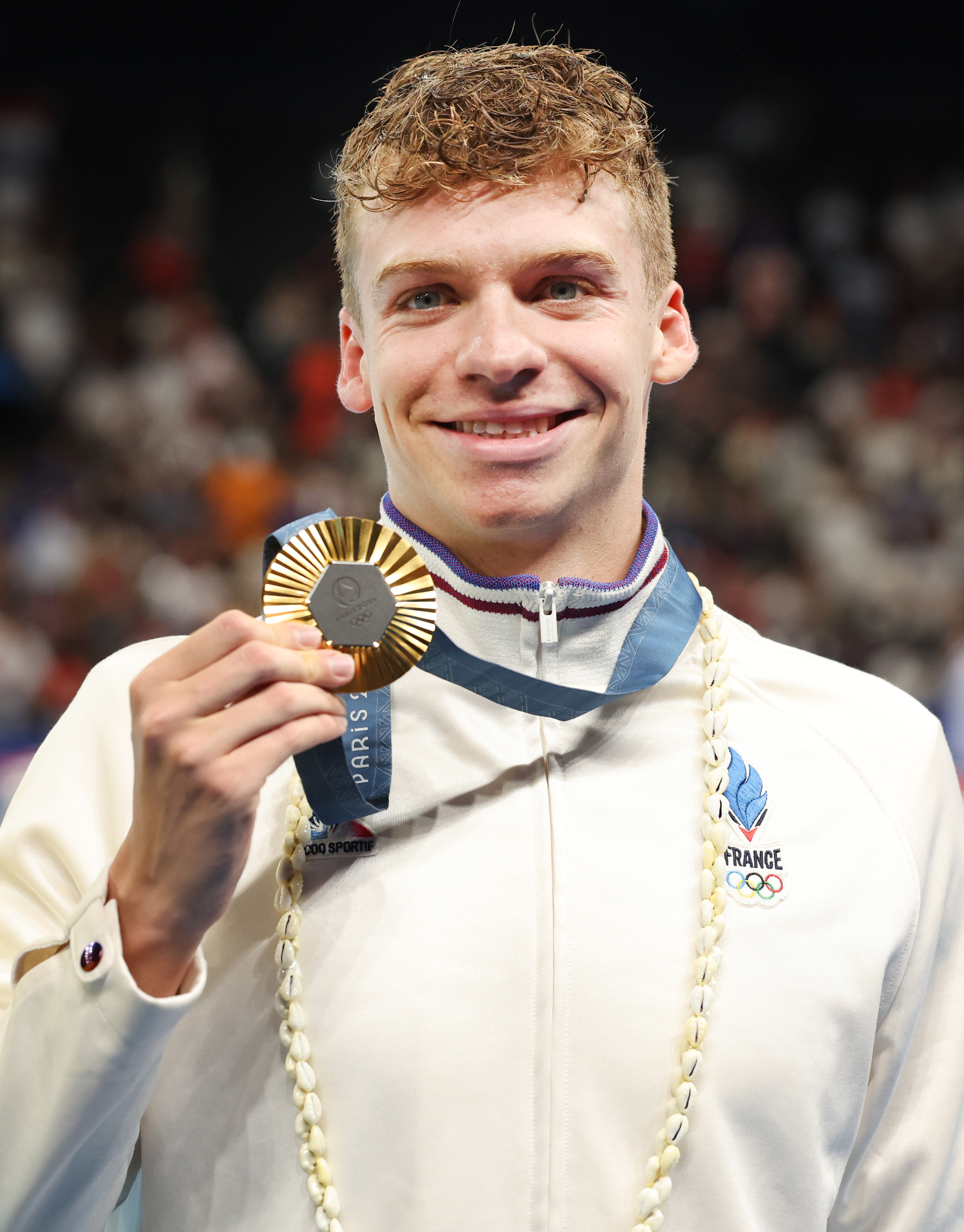 Léon Marchand with his Gold medal after winning the Men's 200-meter Breaststroke Final on day five of the Olympic Games Paris 2024 on July 31 in France. | Source: Getty Images