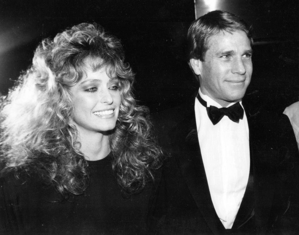 Farrah Fawcett and Ryan O'Neal during a party at Studio 54 on December 4, 1981 in New York City. | Source: Getty Images