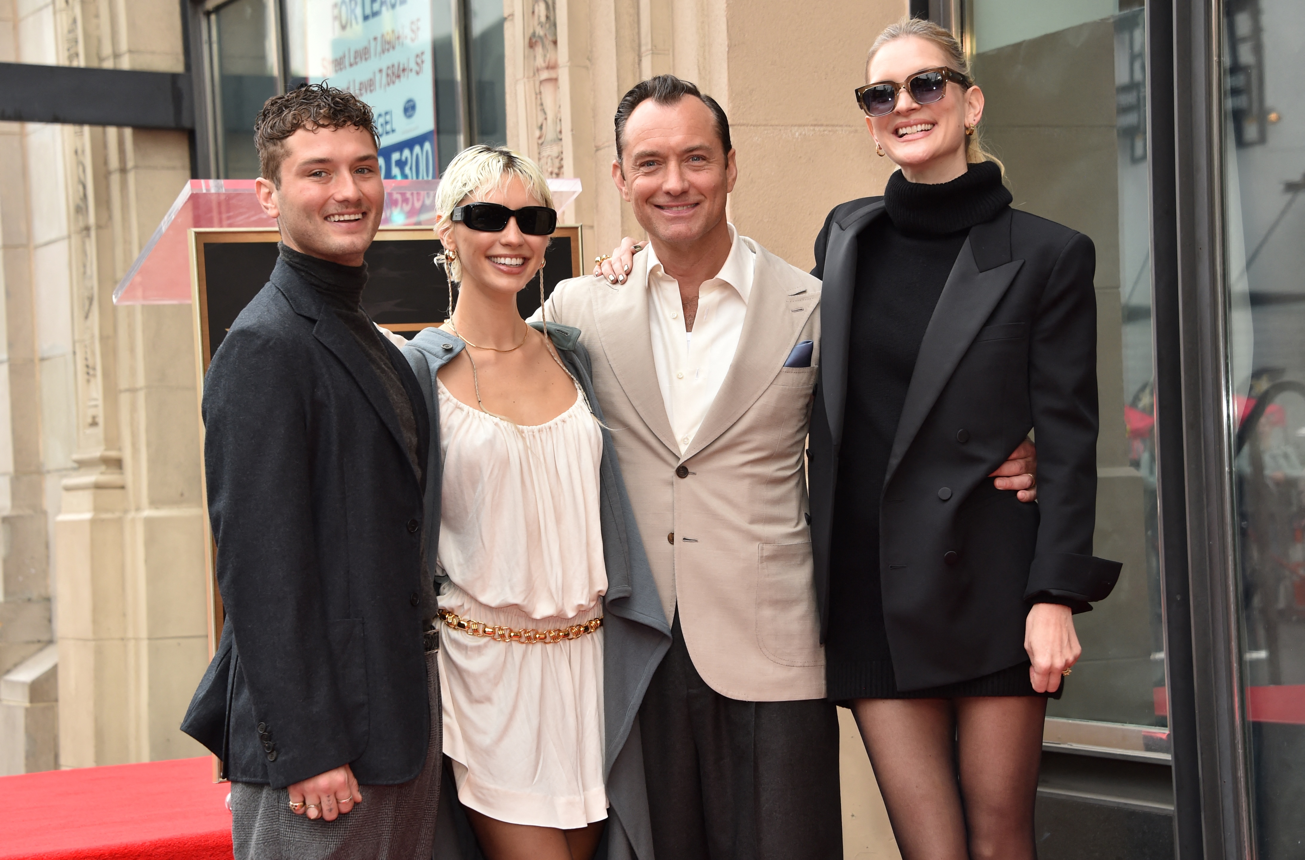 Raff Law, Iris Law, Jude Law, and Phillipa Coan in Hollywood, California, on December 12, 2024 | Source: Getty Images