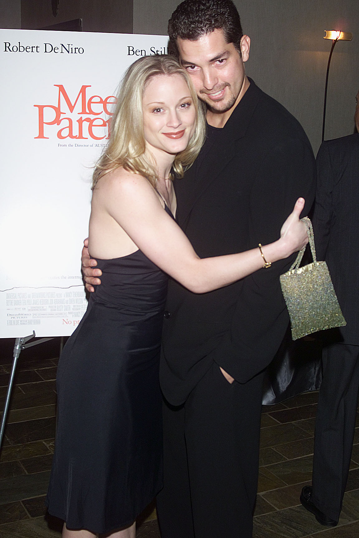 Teri Polo and Anthony Moore pose for photographers at the New York Premiere of the film "Meet The Parents" in 2000. | Source: Getty Images