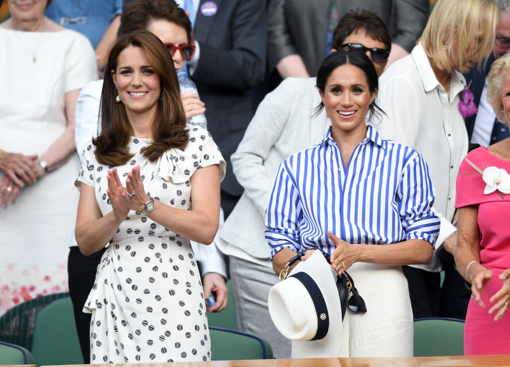 Kate Middleton and Meghan Markle at the Wimbledon Tennis Championships at the All England Lawn Tennis and Croquet Club on July 14, 2018 in London, England. | Photo: Getty Images