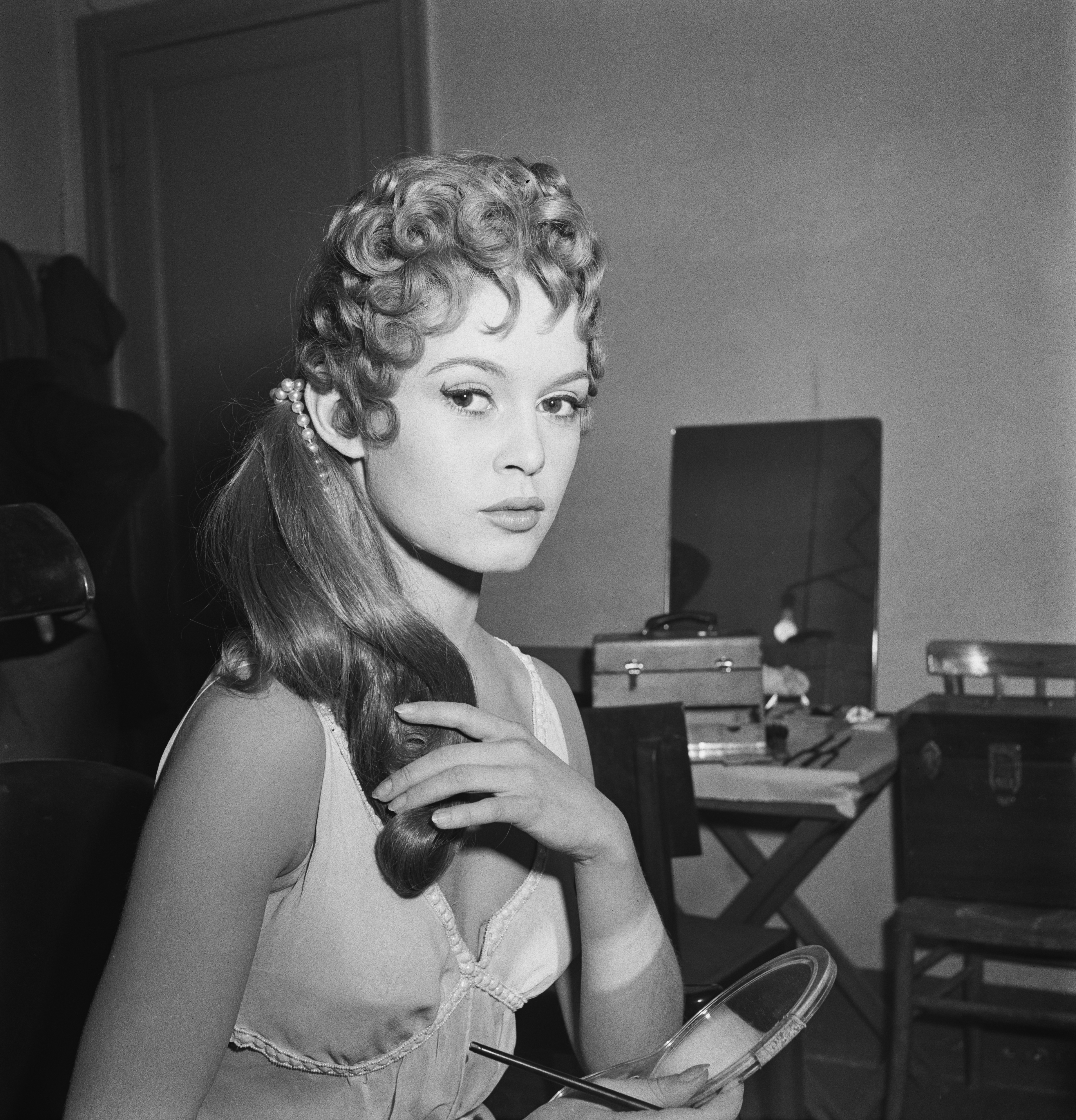 Brigitte Bardot during the filming of "Nero's Weekend," at Cinecitta Studios on January 1, 1956 in Rome, Italy. | Source: Getty Images