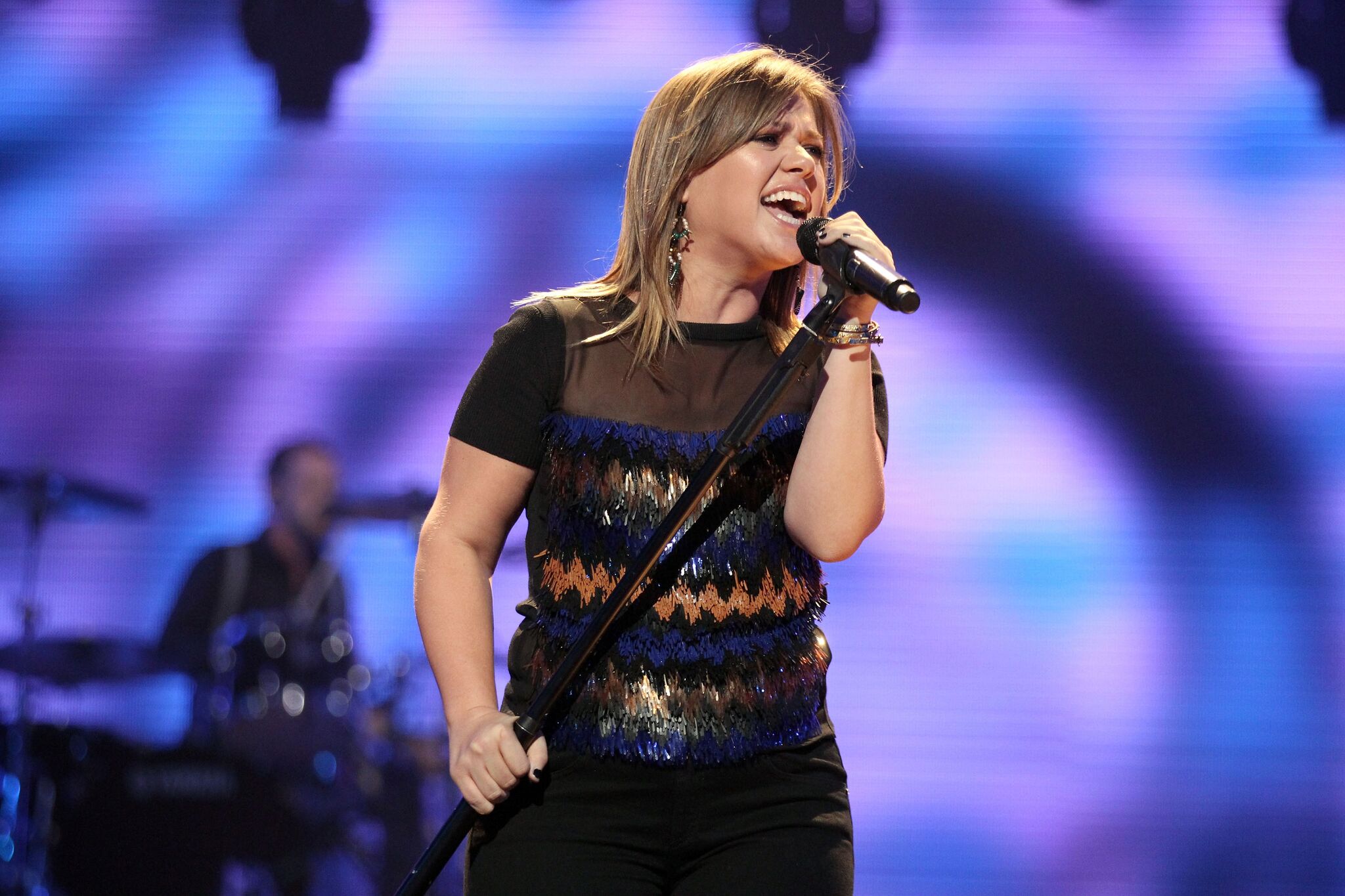  Kelly Clarkson performs onstage at the iHeartRadio Music Festival | Getty Images