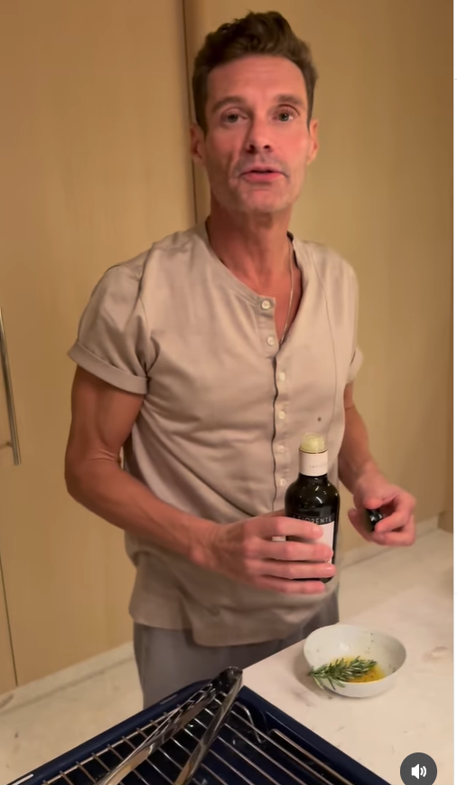 Ryan Seacrest is seen holding a bottle of virgin olive oil, from a post dated October 1, 2025 | Source: Instagram/ryanseacrest