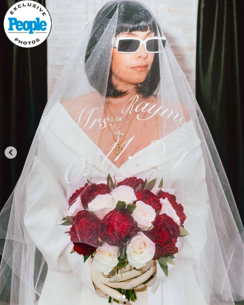 Jenn Goicoechea posing in her wedding attire posted on February 14, 2024 | Source: Instagram/people