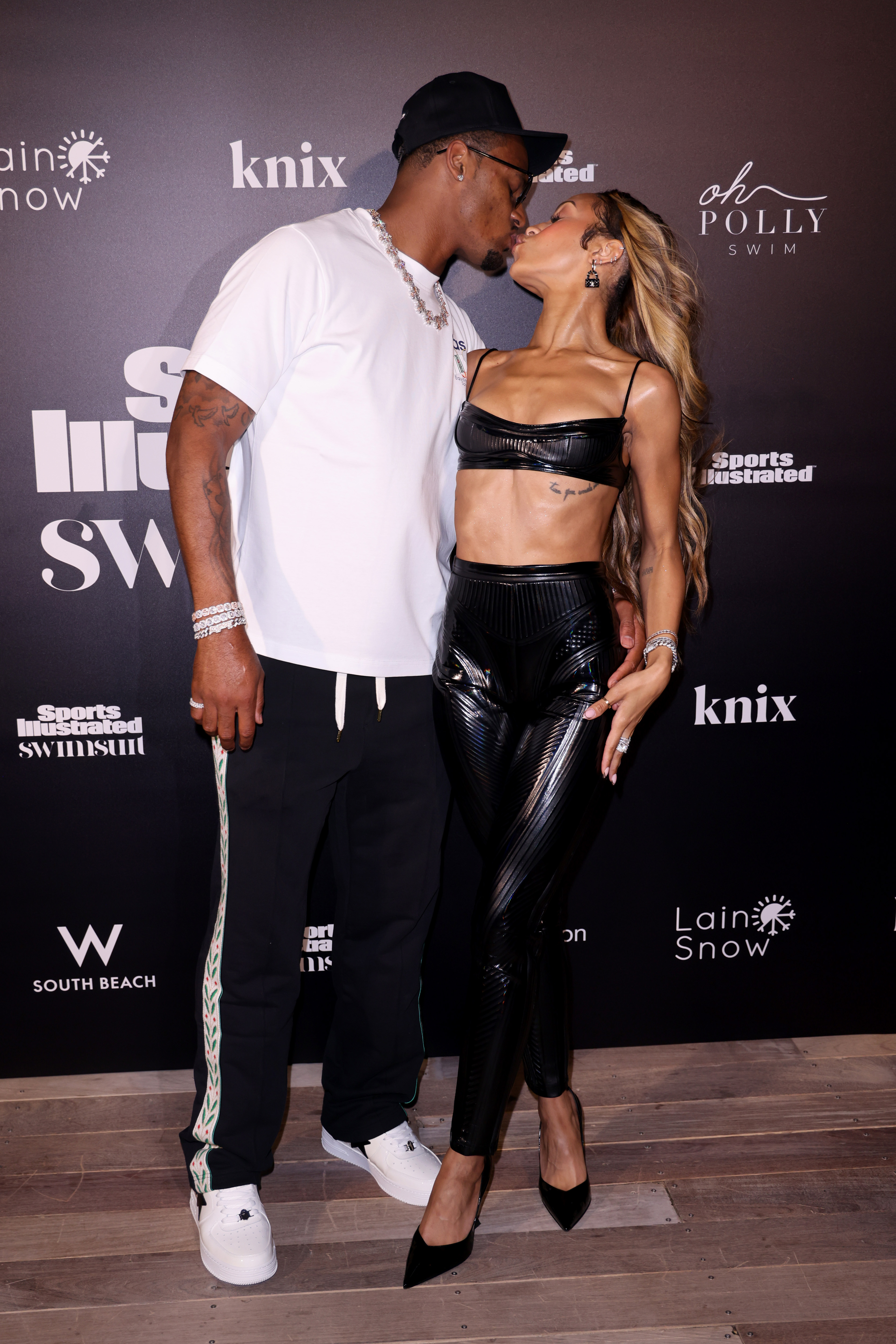 Deshaun Watson and Jilly Anais at the Sports Illustrated Swimsuit Show during Miami Swim Week in Miami Beach, Florida on June 1, 2024. | Source: Getty Images