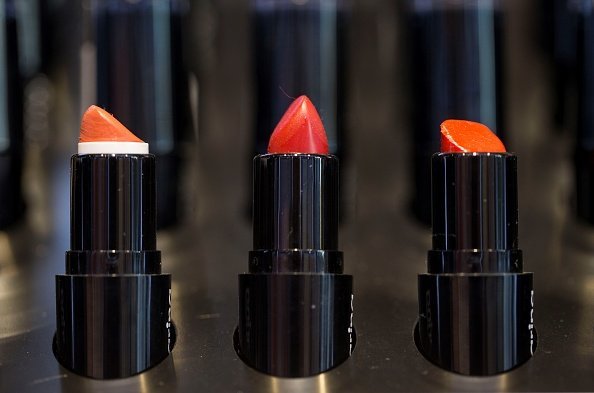 A collection of various types of colors of lipsticks at a make-up and cosmetic products shop | Photo: Getty Images