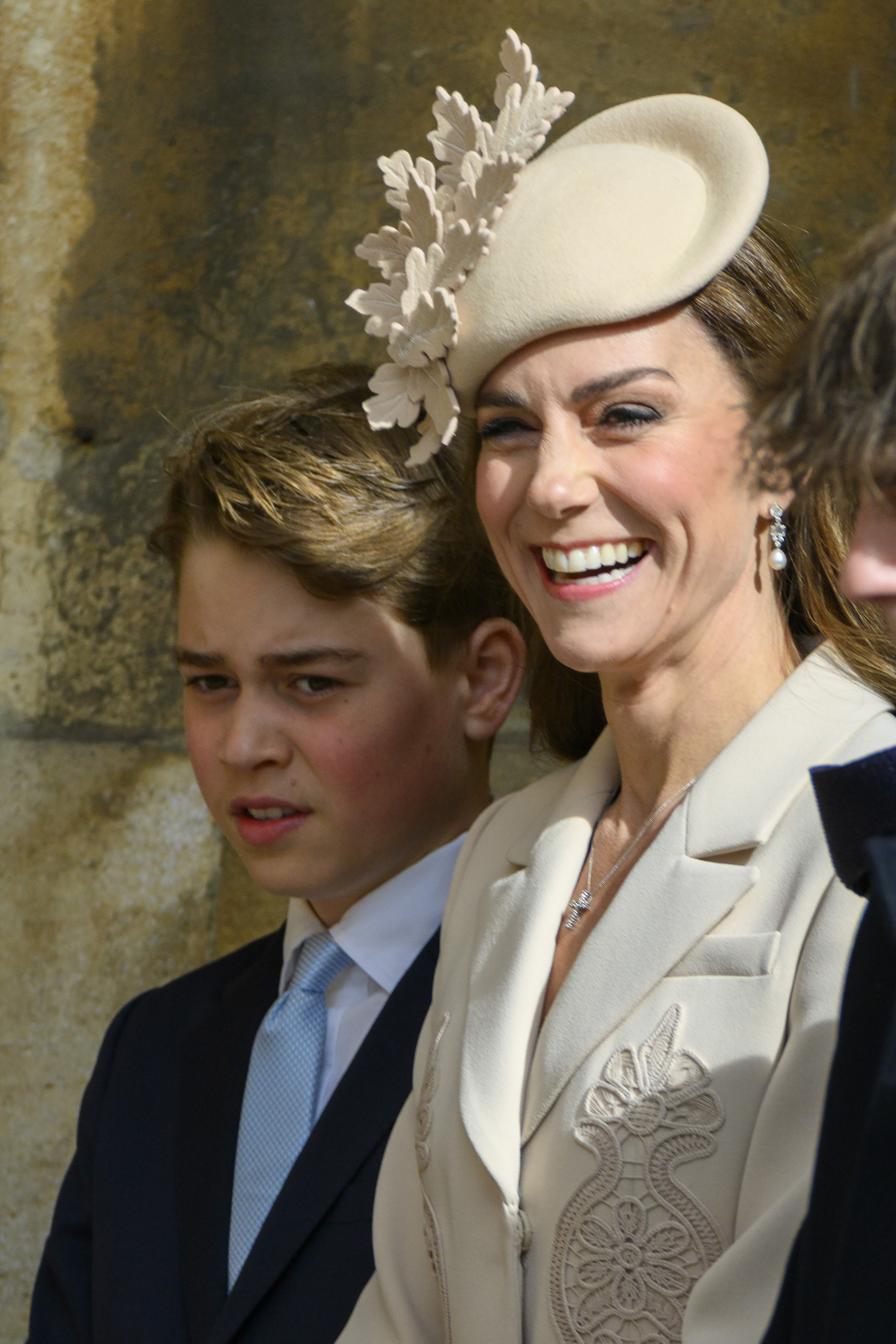 A close-up that rather settles the debate. Prince George, 12, stands shoulder to shoulder with the Princess of Wales, his wind-tousled hair and serious expression giving him every bit the air of a young man who has no idea quite how much the internet is about to discuss him. He really is almost as tall as his mother — and she is in heels.
