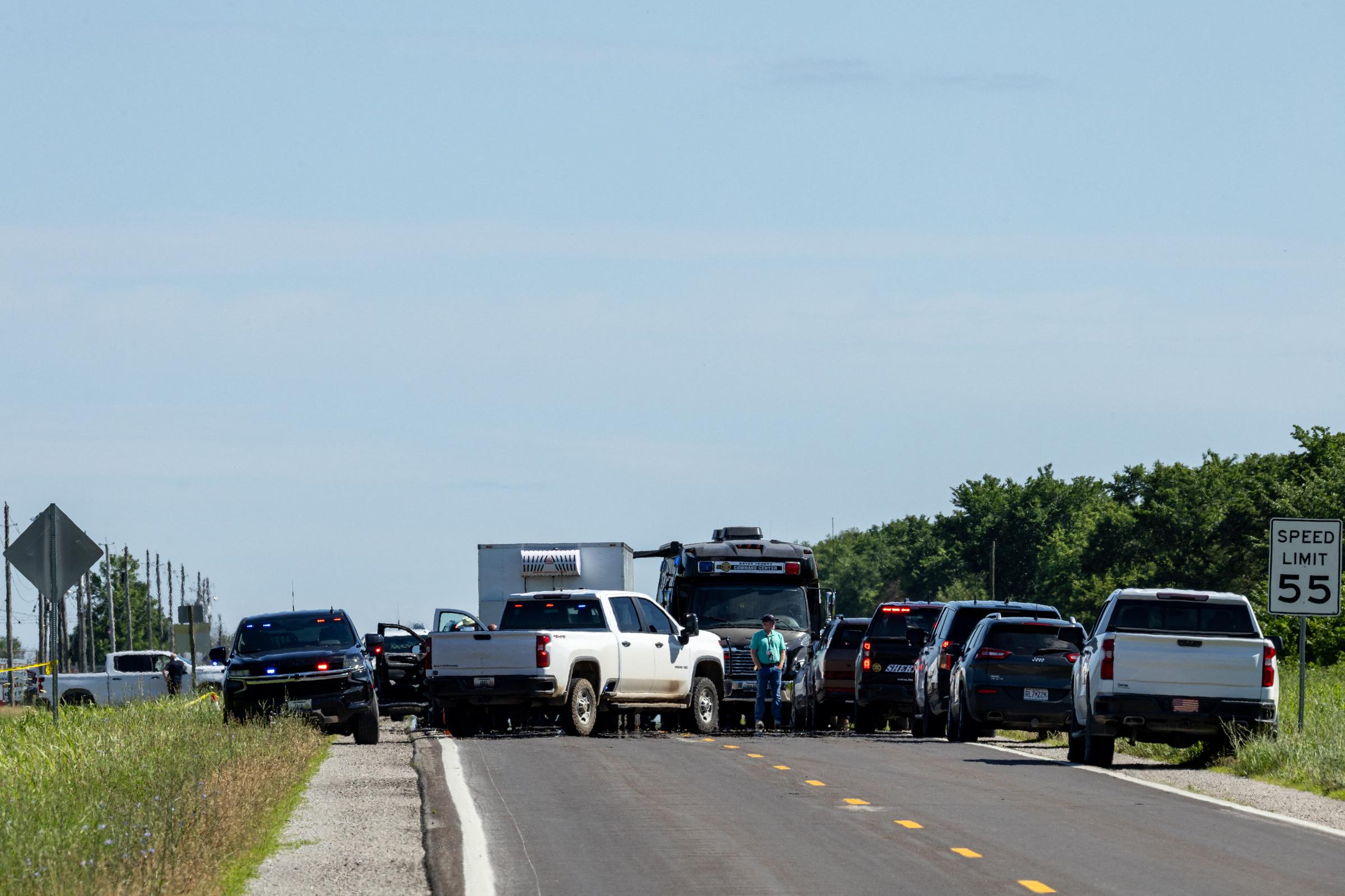 Authorities secure the area near Butler Memorial Airport after a skydiving plane crashed shortly after takeoff, killing all 12 people aboard. Investigators are examining whether the pilot was attempting an emergency landing before the aircraft went down. | Source: Getty Images