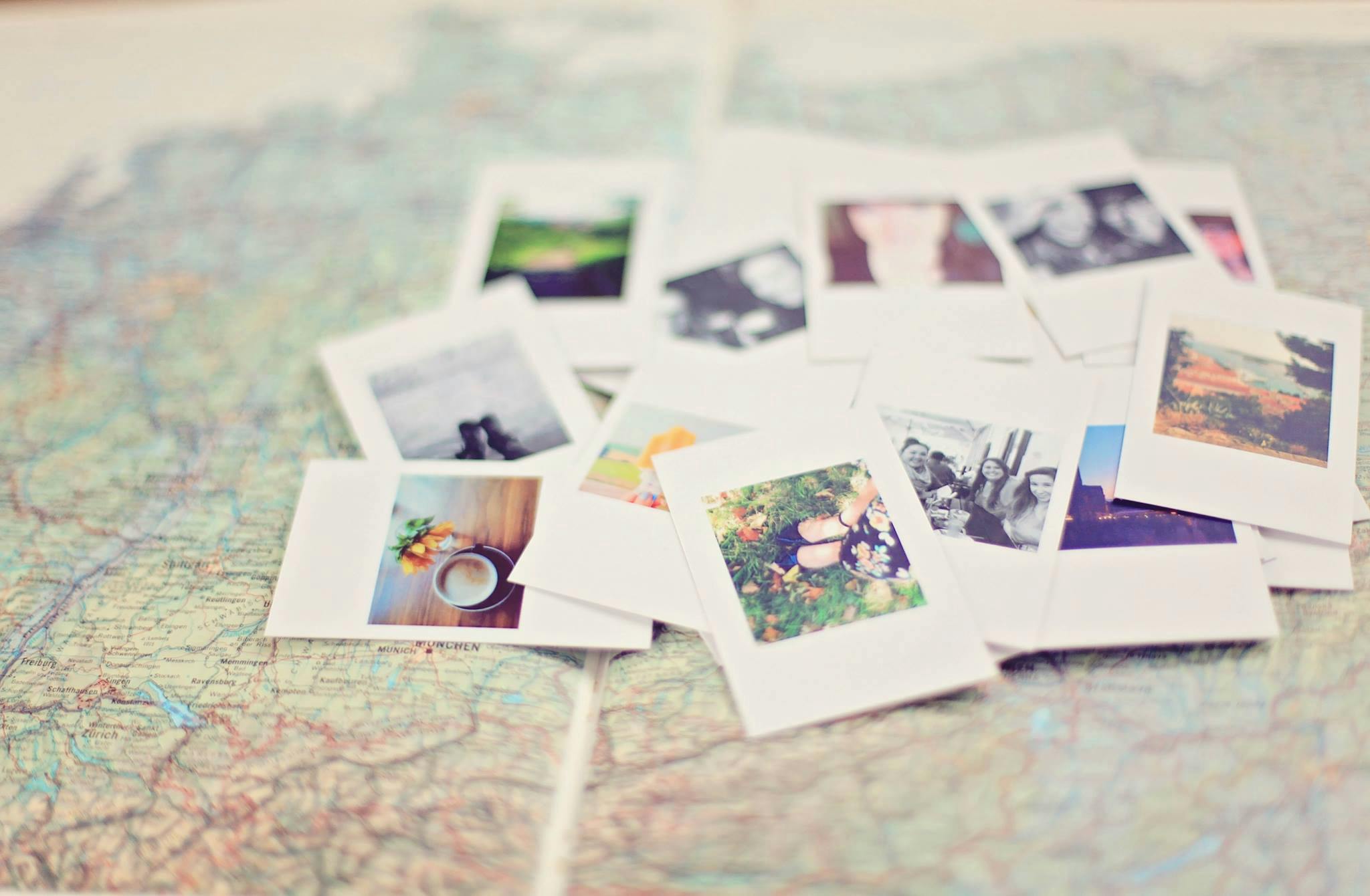 Photos scattered on a table | Source: Pexels