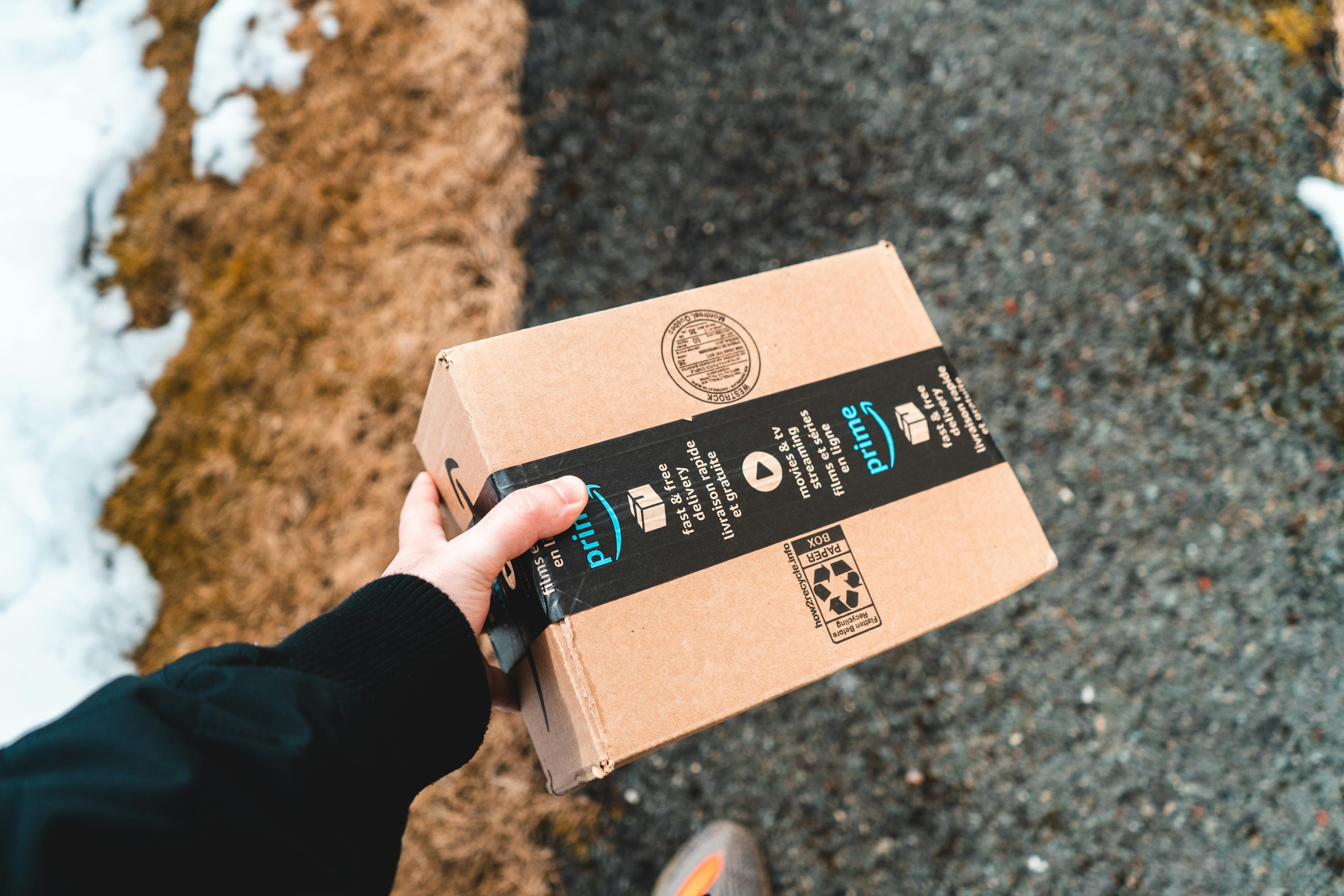 A  person holding a package | Source: Pexels