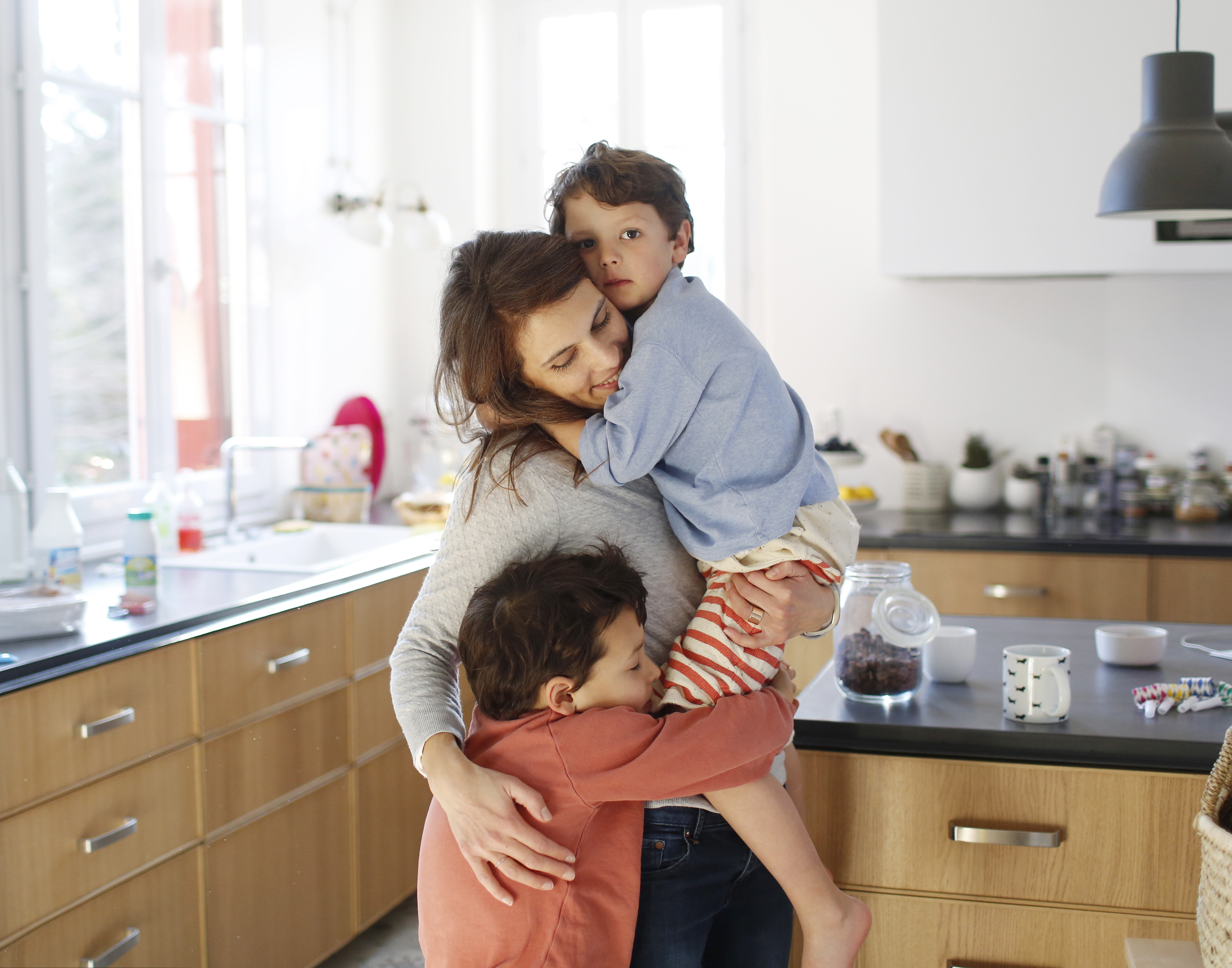 A mom and her two boys | Source: Getty Images
