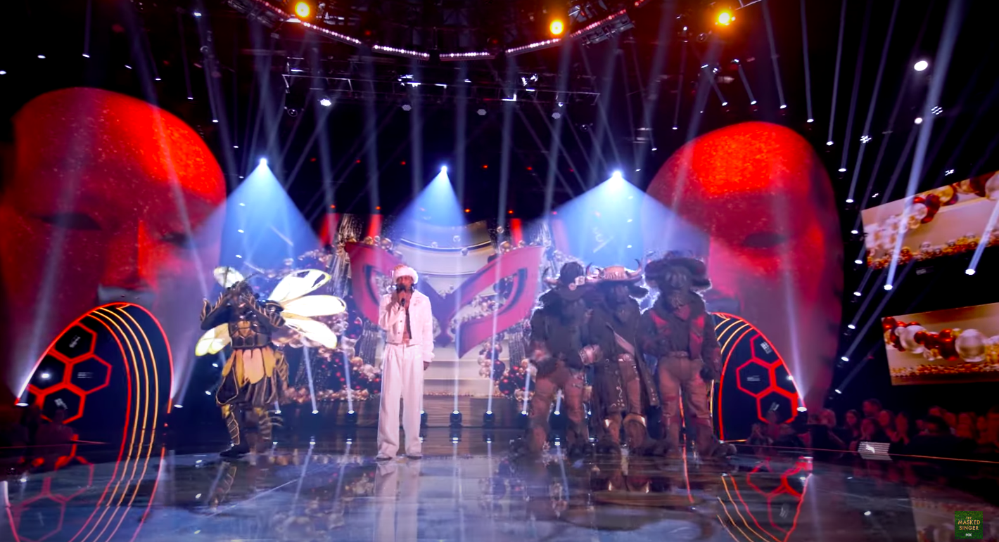 "The Masked Singer" host Nick Cannon gearing up to announce the winner alongside the two finalists, posted on December 19, 2024 | Source: YouTube/The Masked Singer