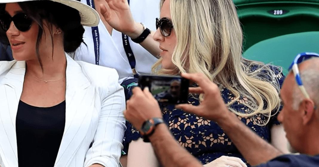 Hasan Hasanov taking a selfie in front of Meghan Markle. I Image: YouTube/ Access