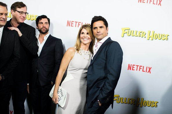 Bob Saget and Lori Loughlin attend the premiere of Netflix's 'Fuller House' at Pacific Theatres at The Grove in Los Angeles | Photo: Getty Images