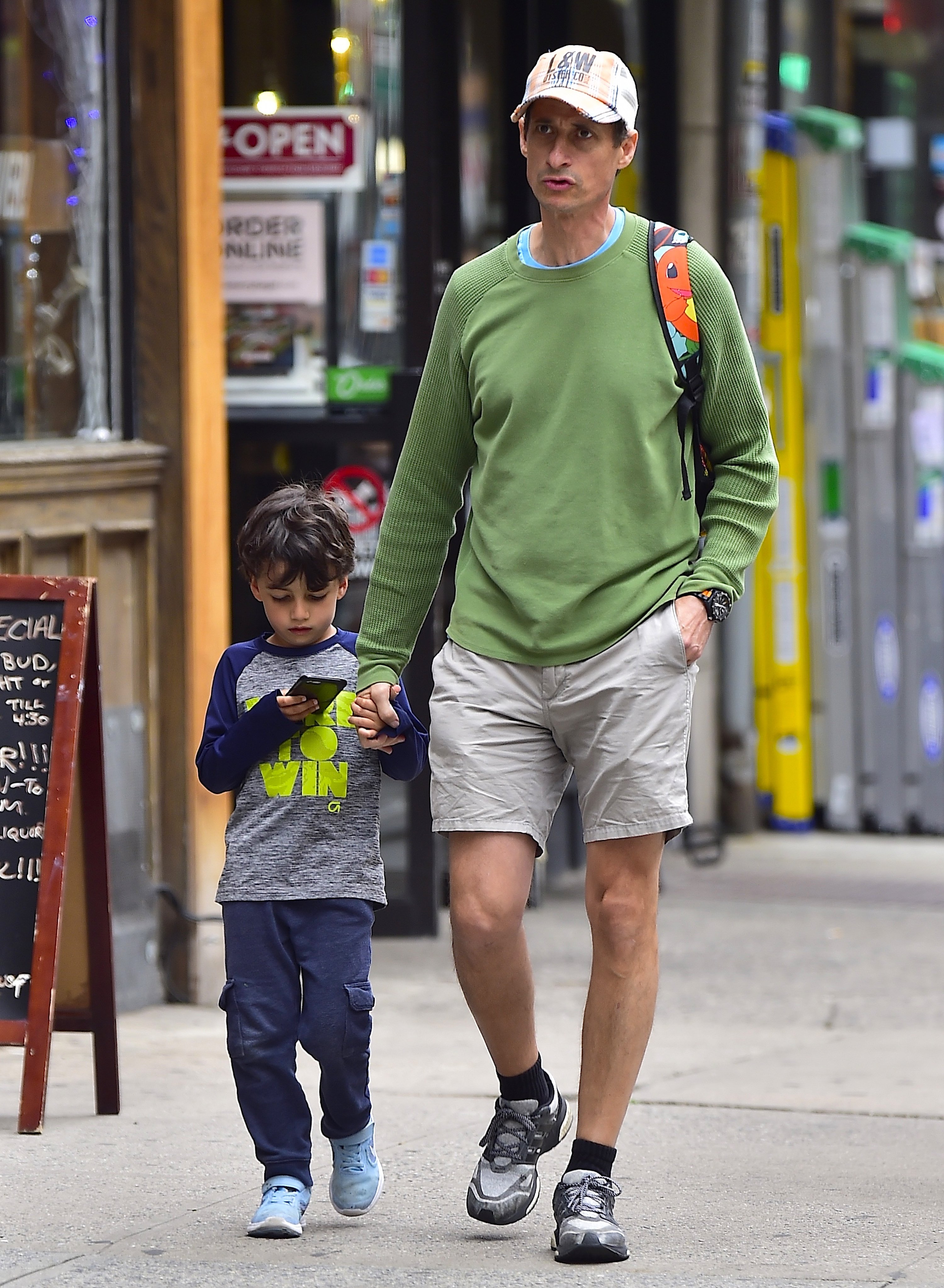 Anthony Weiner (R) and son Jordan Zain Weiner are seen in Chelsea on June 5, 2017 in New York City. | Source: Getty Images