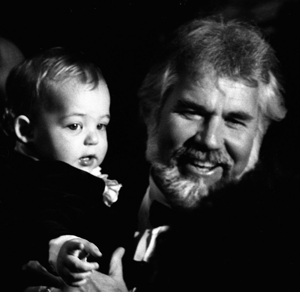 Kenny Rogers and son Christopher Cody Rogers attend 10th Annual American Music Awards on January 17, 1983 at the Shrine Auditorium in Los Angeles, California. | Source: Getty Images