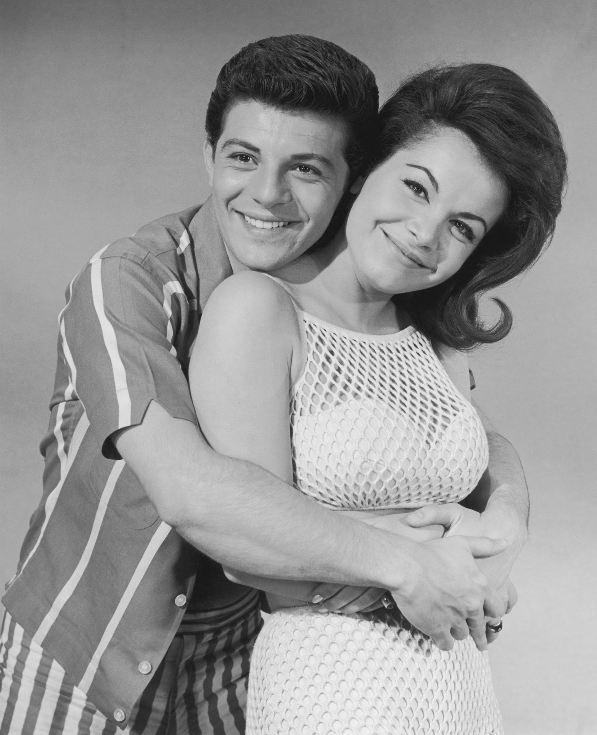 Frankie Avalon and Annette Funicello pictured hugging on January 1, 1962 | Source: Getty Images