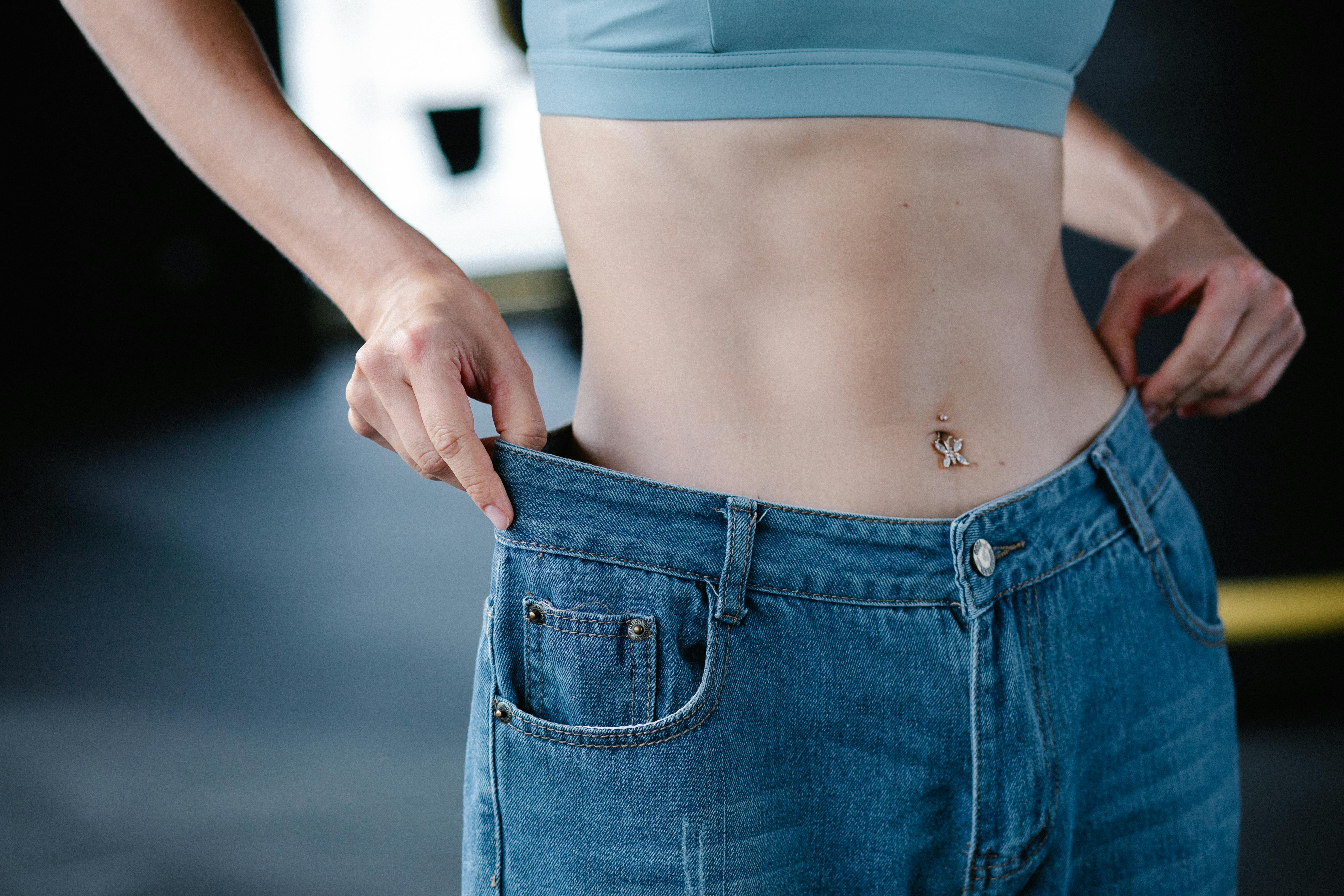 Woman with a belly piercing | Source: Pexels