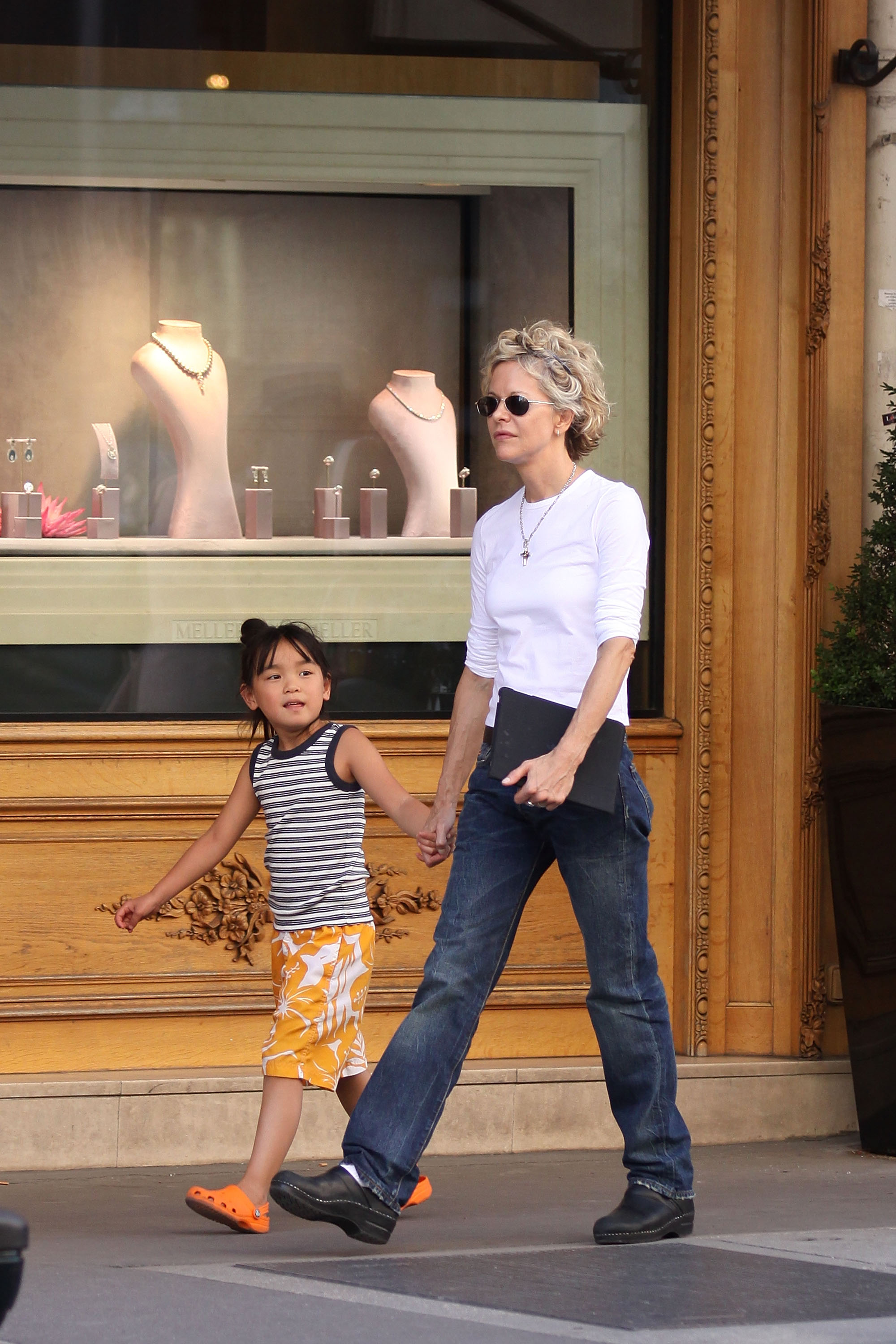 Meg Ryan and Daisy True Ryan in Paris, France on July 4, 2011 | Source: Getty Images