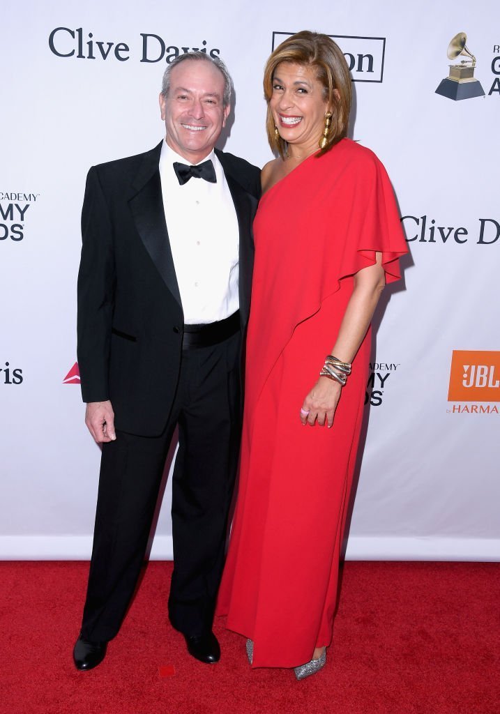 Financier Joel Schiffman (L) and journalist Hoda Kotb attend the Clive Davis and Recording Academy Pre-GRAMMY Gala and GRAMMY Salute to Industry Icons. | Photo: Getty Images