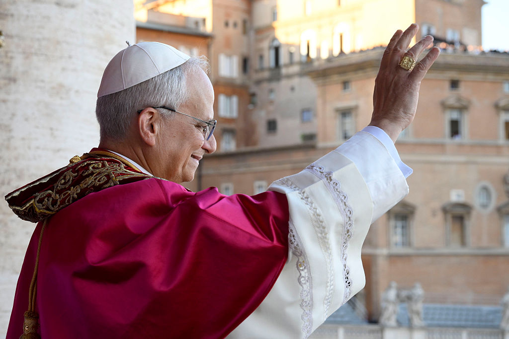 Newly elected Pope Leo XIV, Robert Prevost addresses the crowd on the main central loggia balcony overlooking St Peter's Square on May 08, 2025 in Vatican City, Vatican