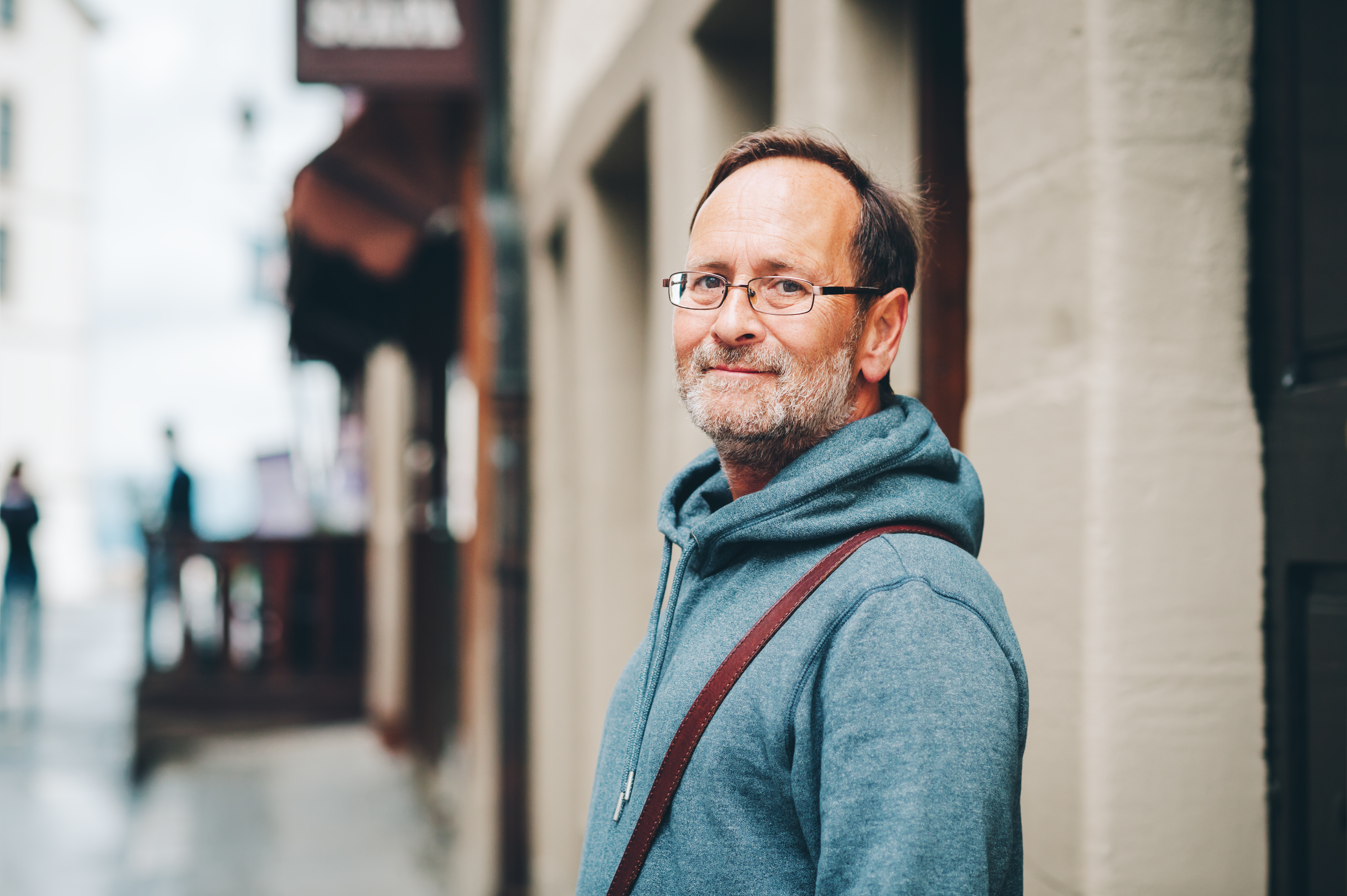 A man standing in a street | Source: Shutterstock