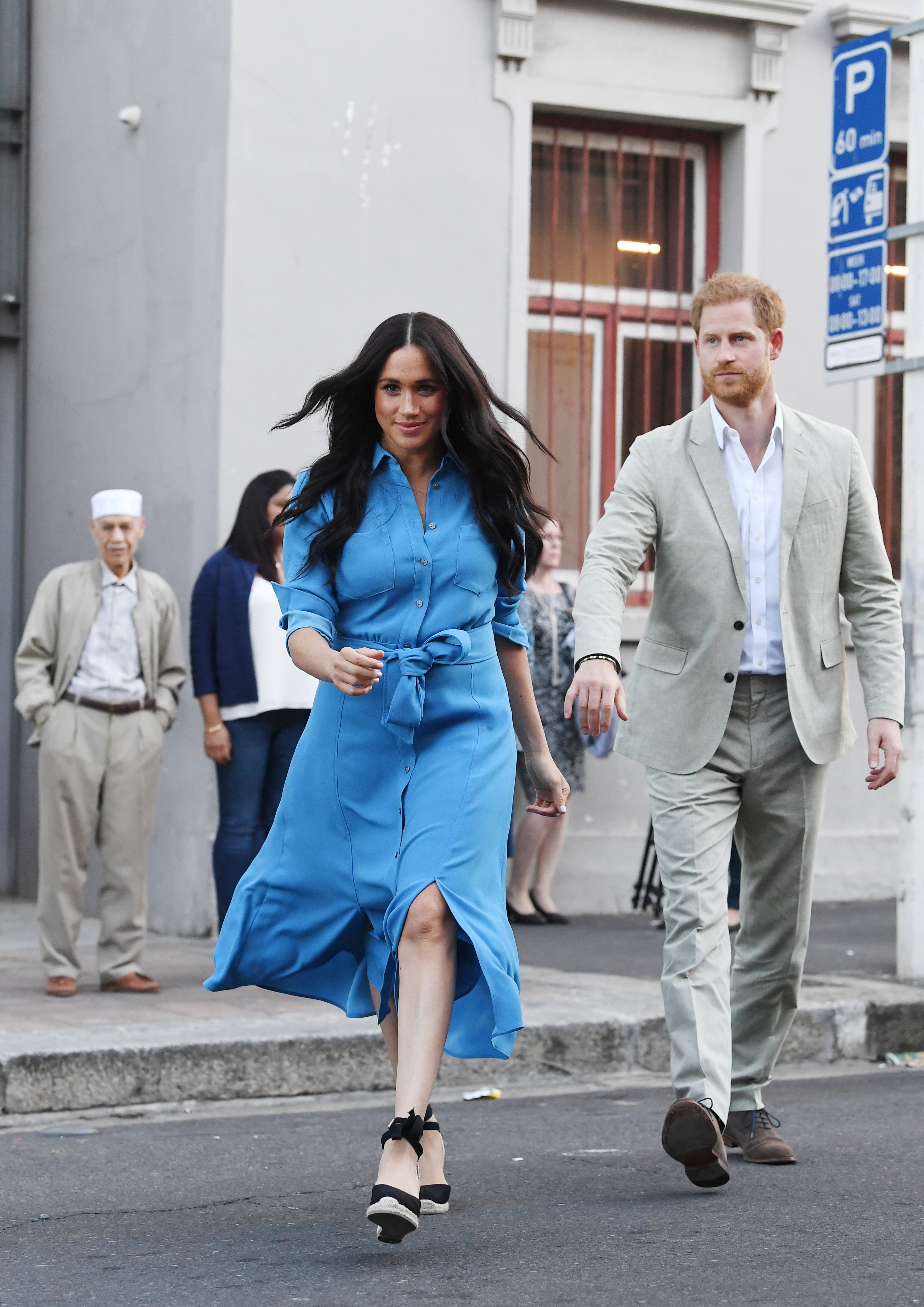 Meghan, Duchess of Sussex and Prince Harry, Duke of Sussex leave after their visit to District 6 Museum on September 23, 2019 | Photo: GettyImages
