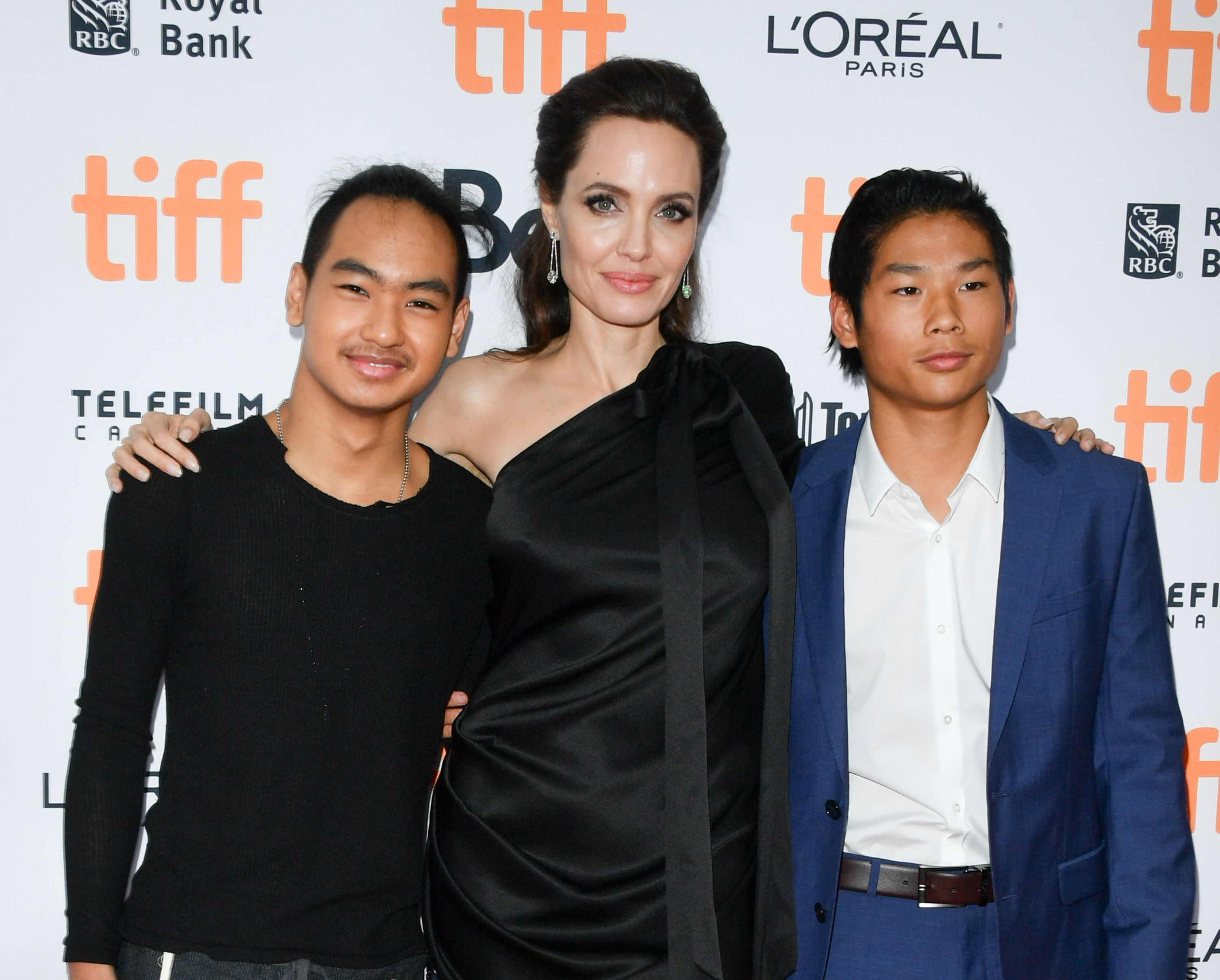Maddox, Angelina Jolie, and Pax Jolie-Pitt attend Toronto International Film Festival - "First They Killed My Father" Premiere at Princess of Wales Theatre in Toronto, Canada, on September 11, 2017. | Source: Getty Images