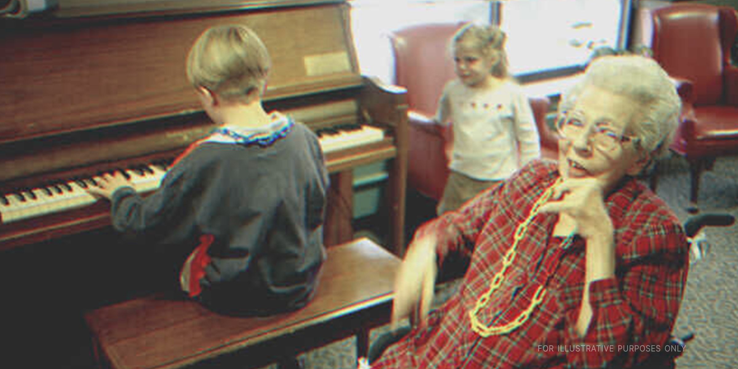 Older woman next to a boy playing piano. | Getty Images